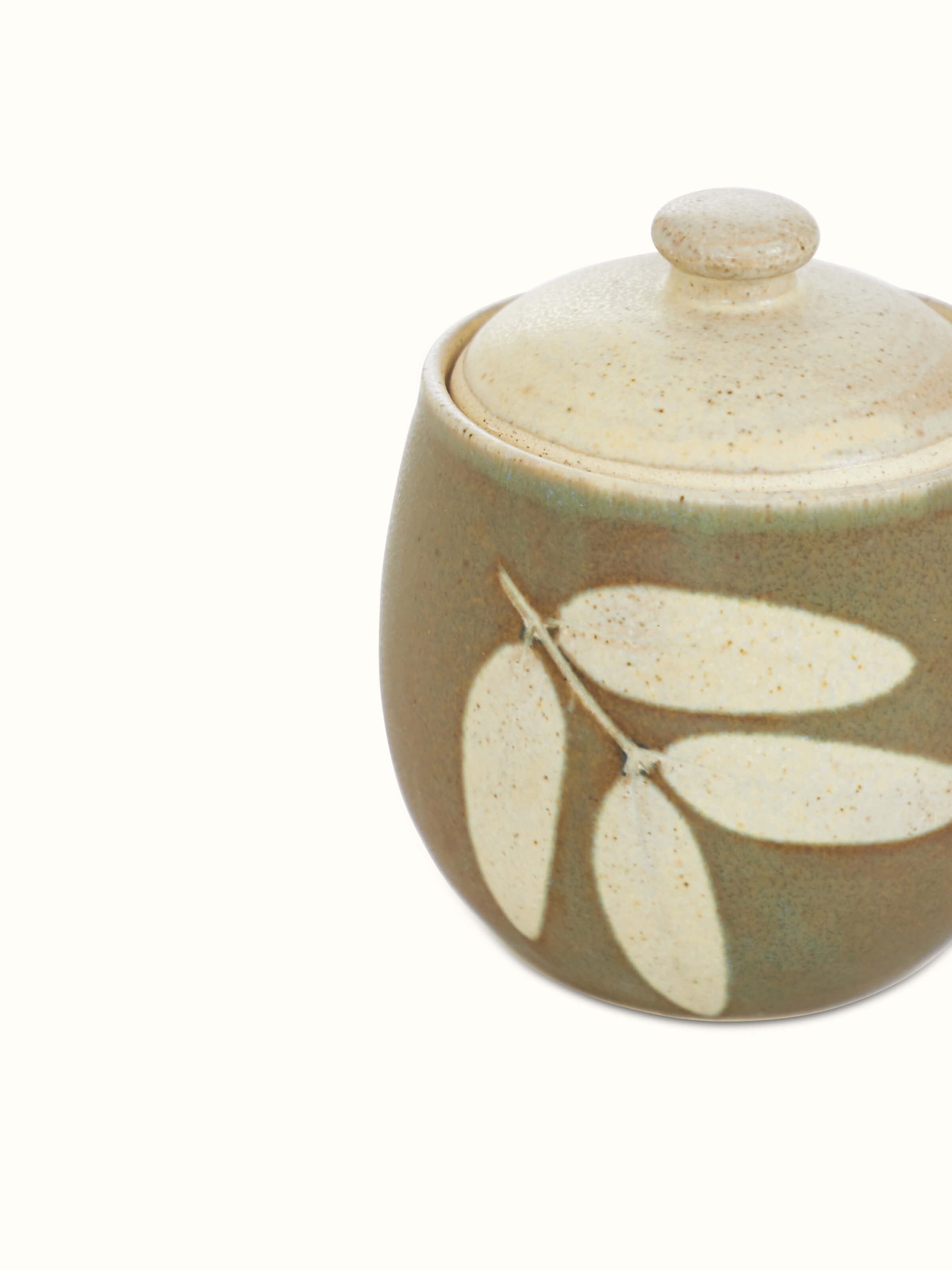 Detailed view of Studio pottery ceramic jar with lid showcasing the smooth finish and functional lid