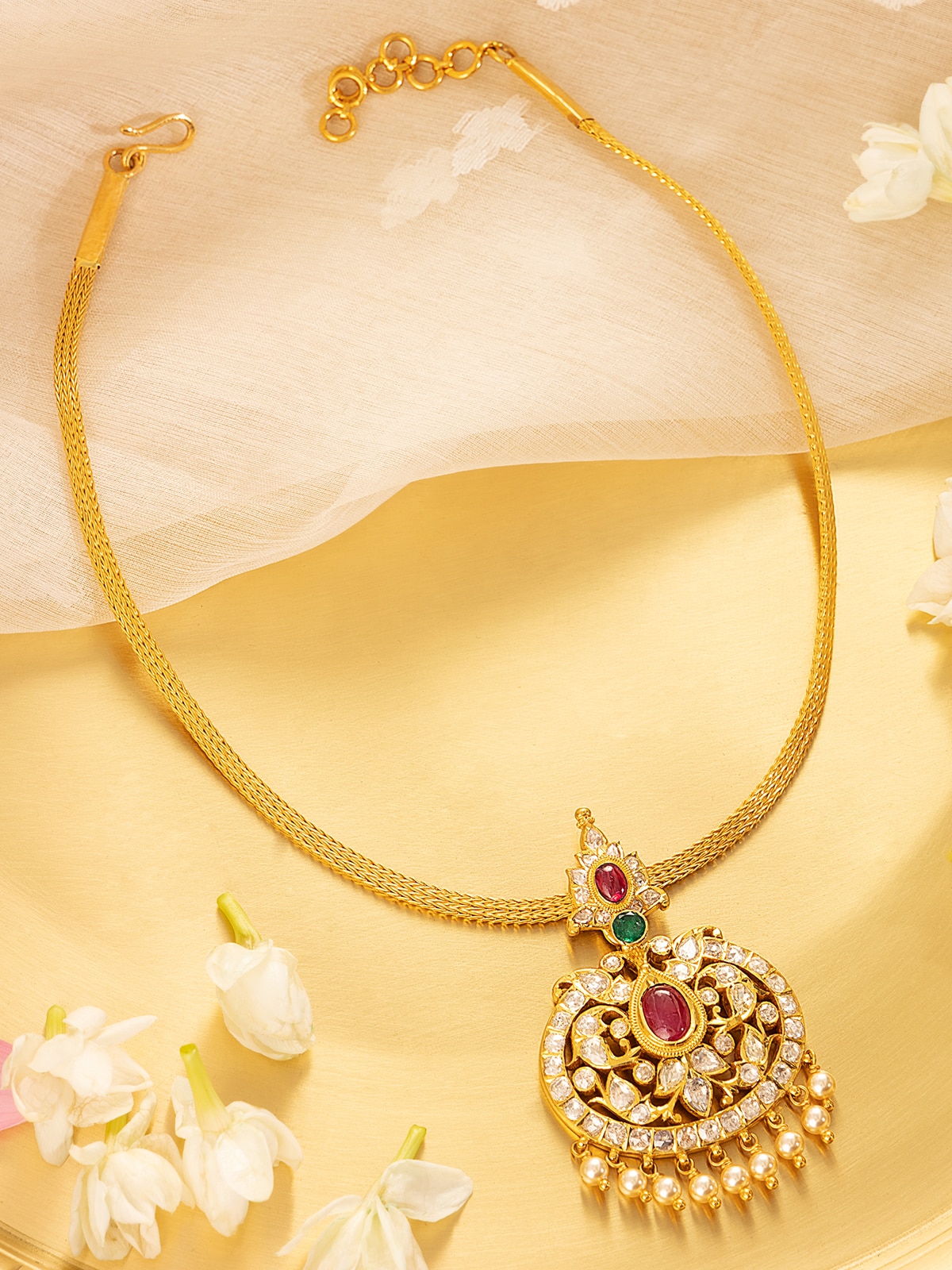 Side angle showing detailed patterns on 22 Karat gold collar necklace