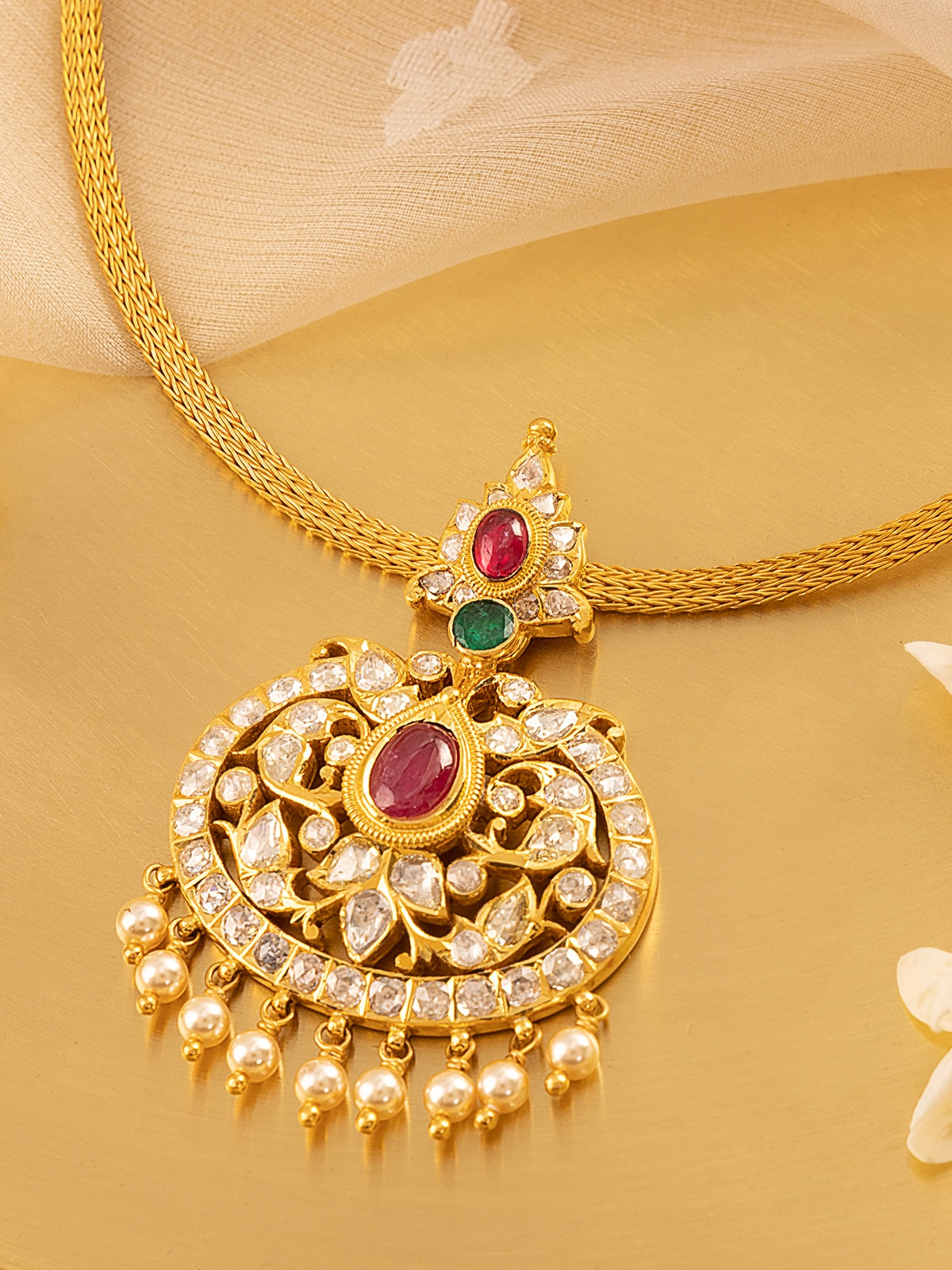 Close-up showing texture and design details of Kundala Velai gold collar necklace
