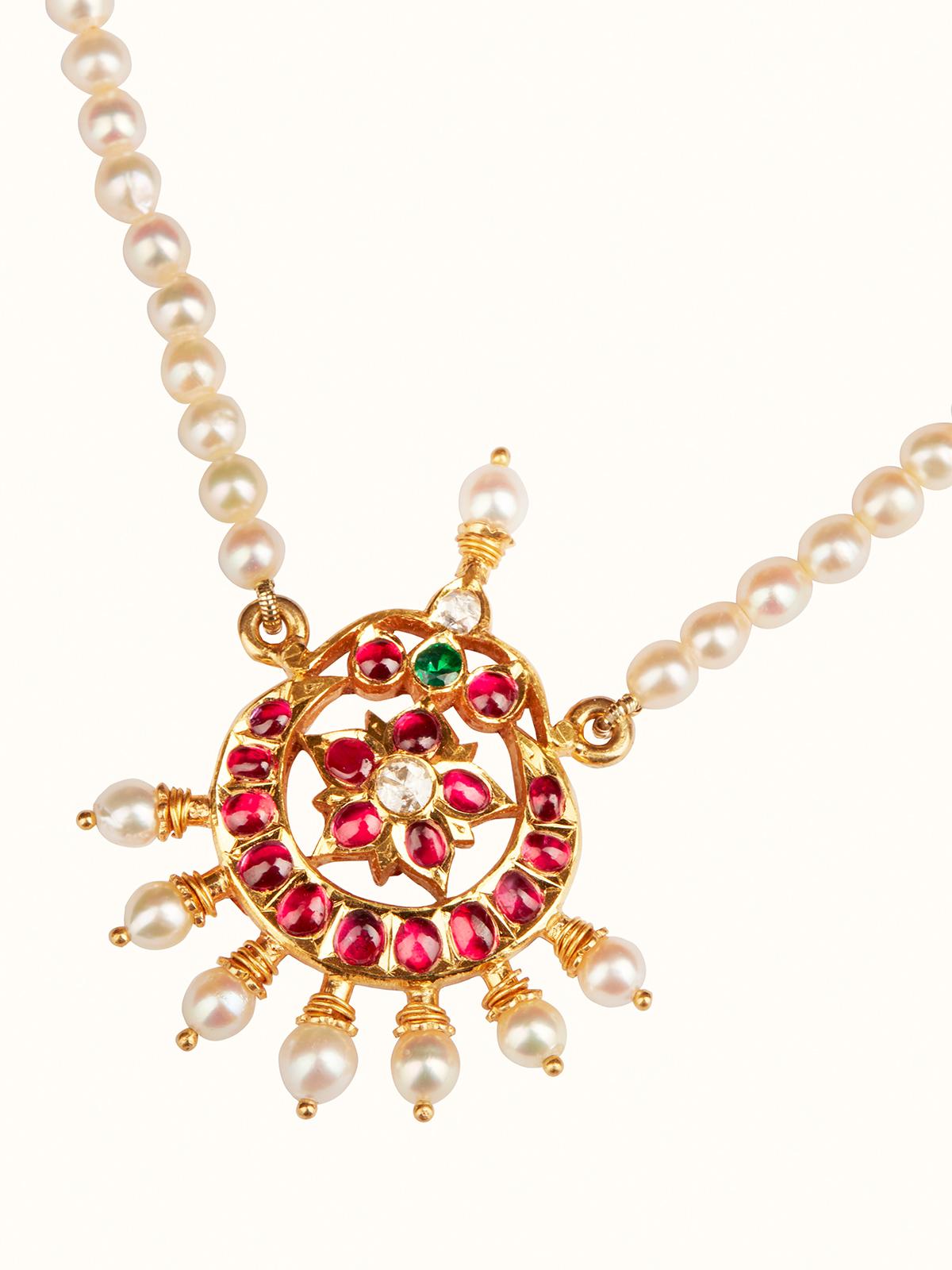 Close-up view of Kundala Velai 22 Karat Gold Collar Necklace featuring intricate gold design and luxurious finish.