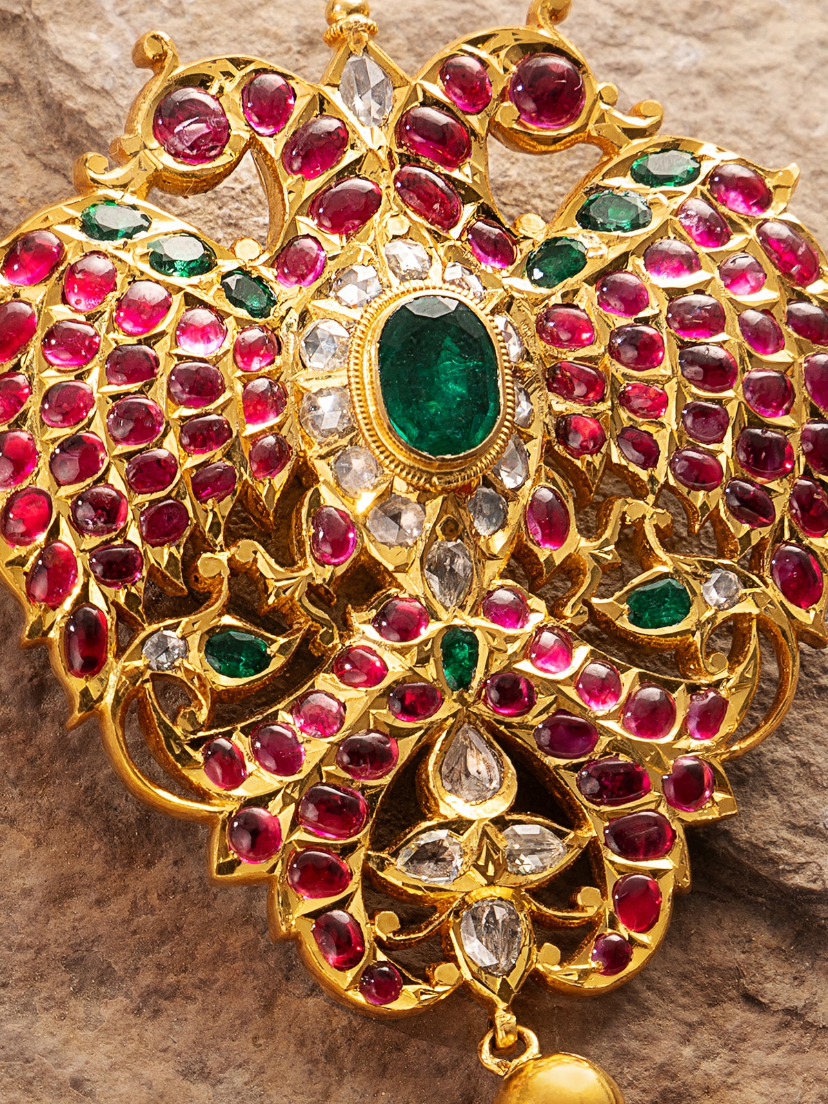 Detailed shot showing fine texture and design of Kundala Velai gold brooch pin