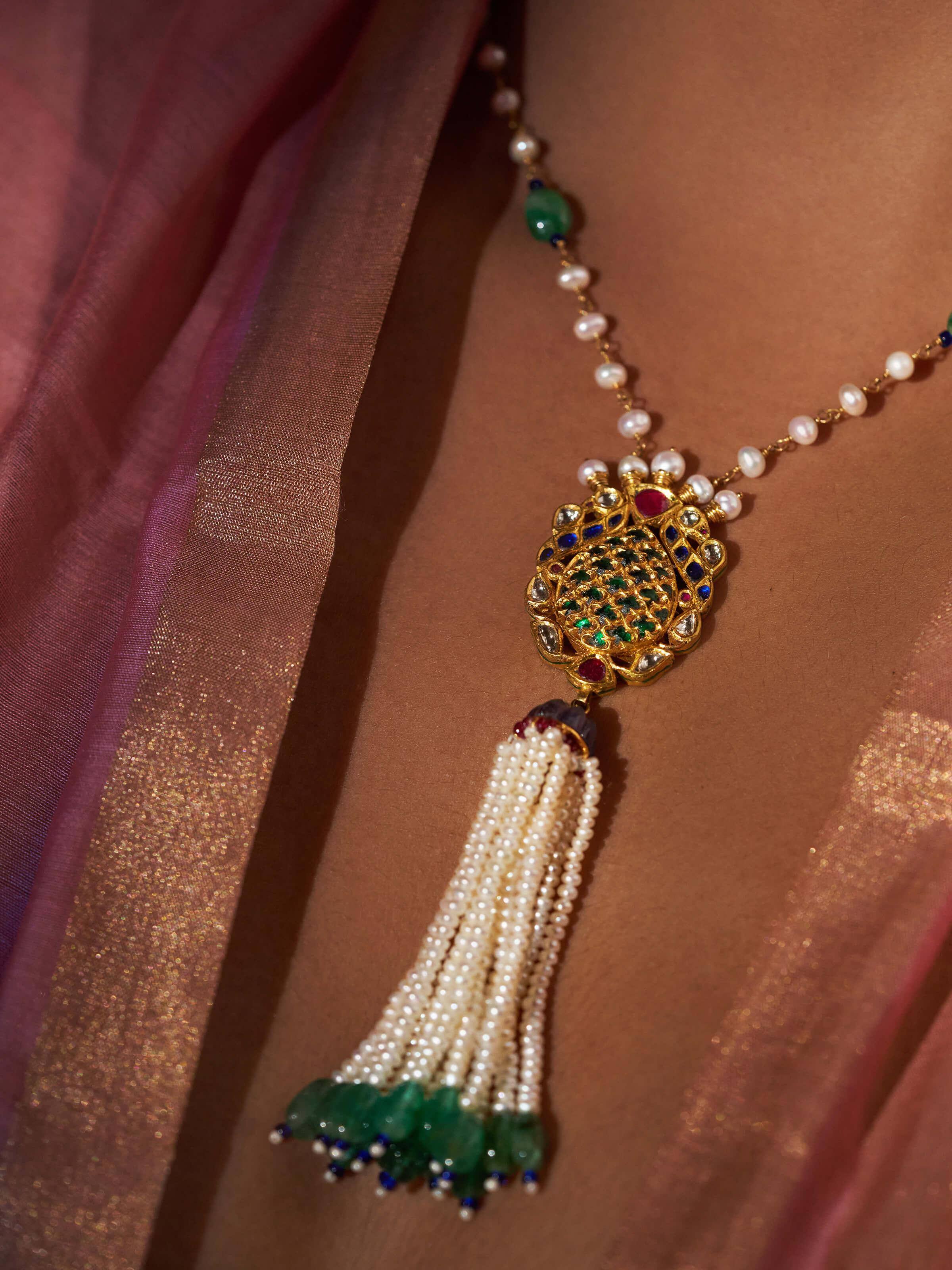 Detailed shot emphasizing the texture and finish of the chain and pendant