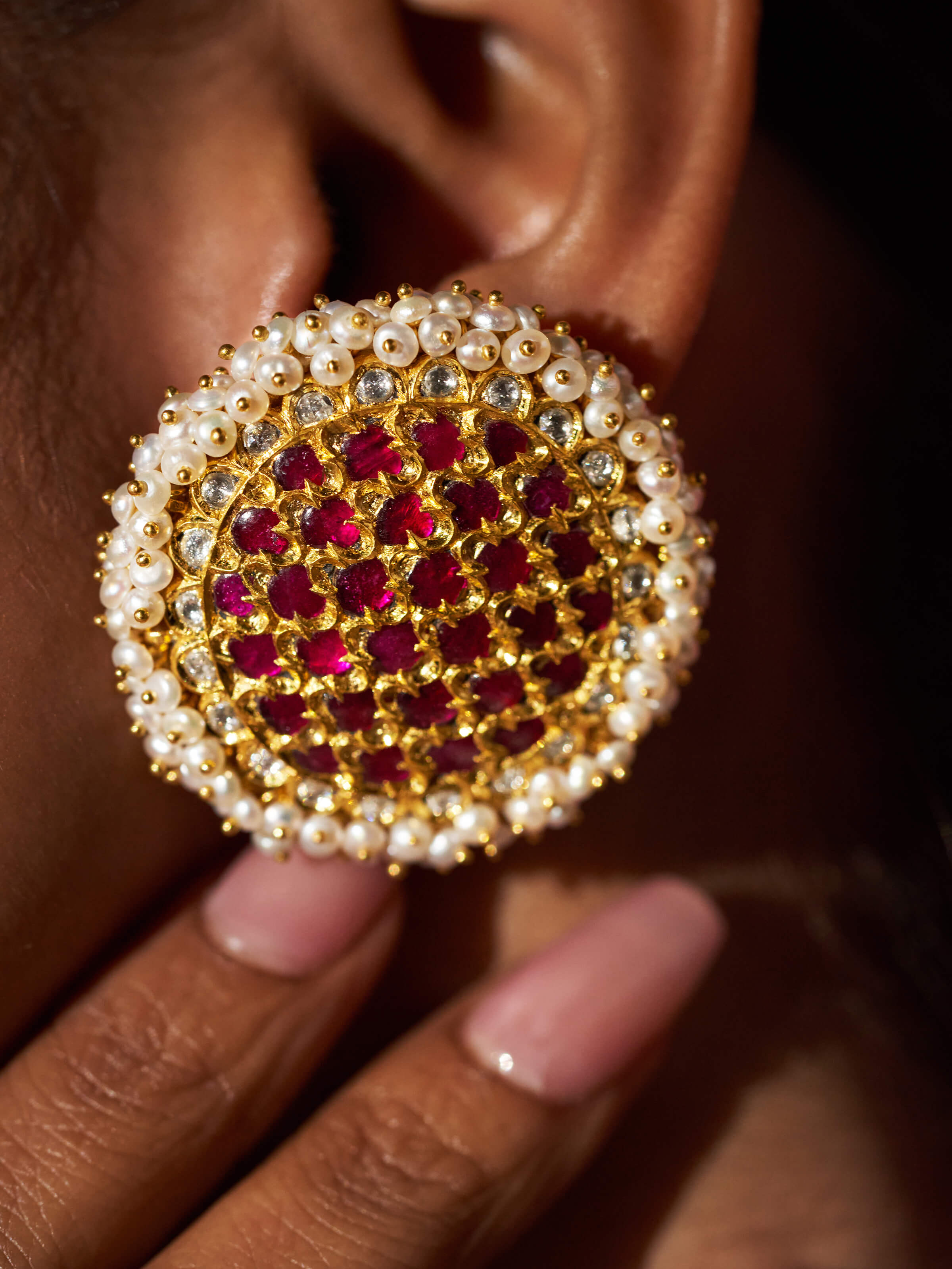 Close-up shot emphasizing the fine gold texture and shine