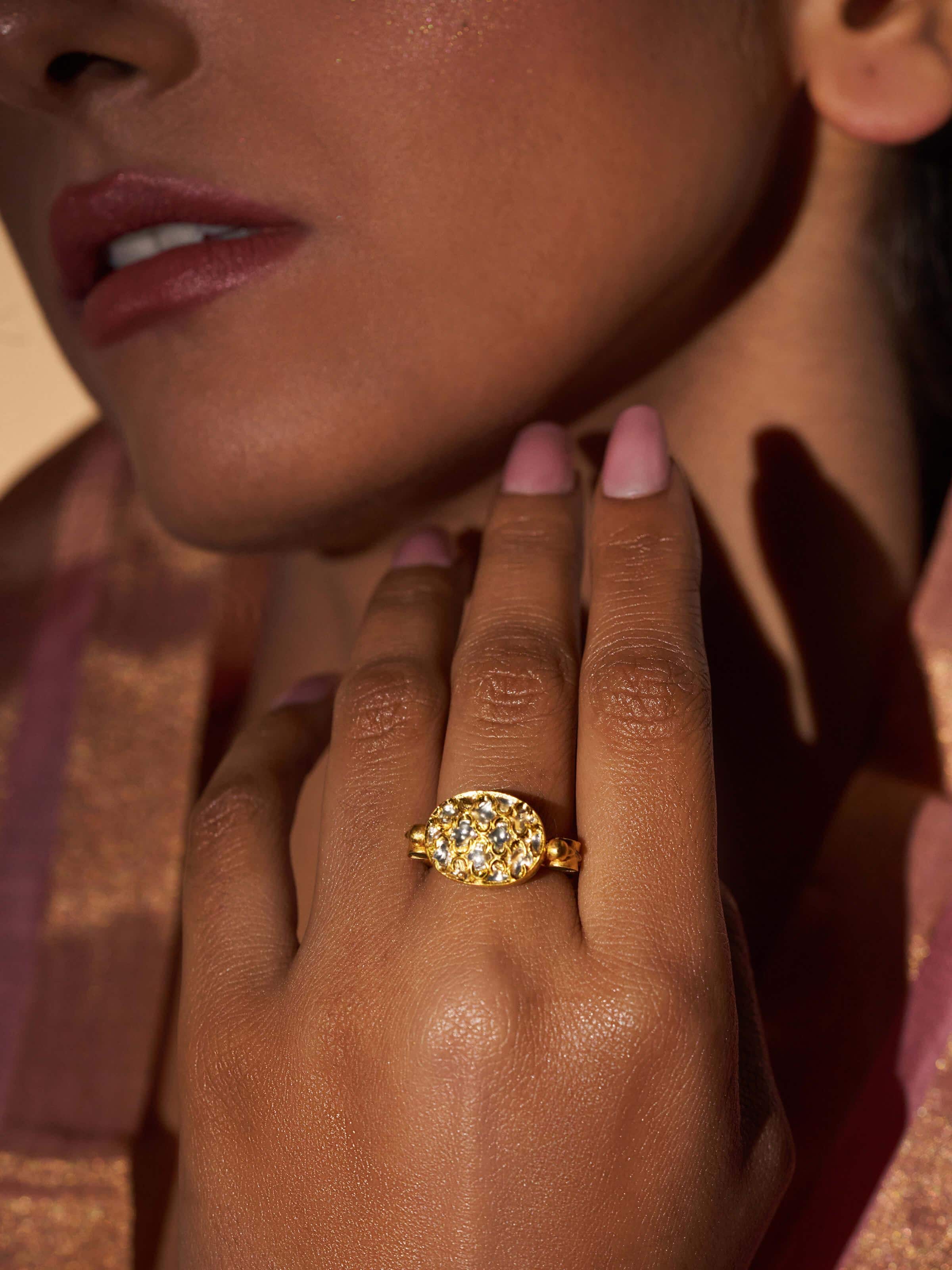 Lifestyle image of Badroom 22 Karat gold ring worn as a statement piece with ethnic attire.