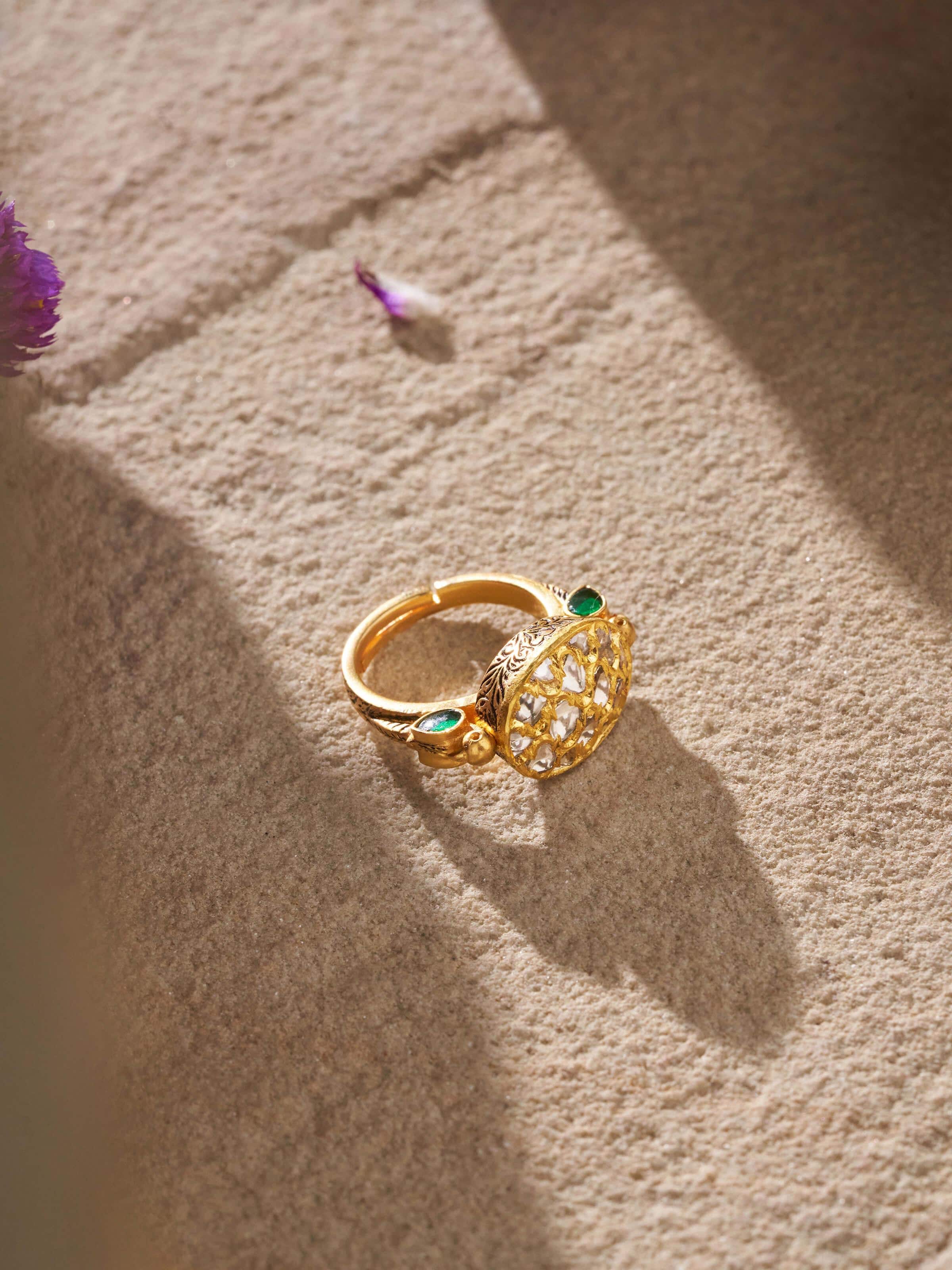 Lifestyle shot of Badroom 22 Karat gold ring enhancing a regal traditional look.