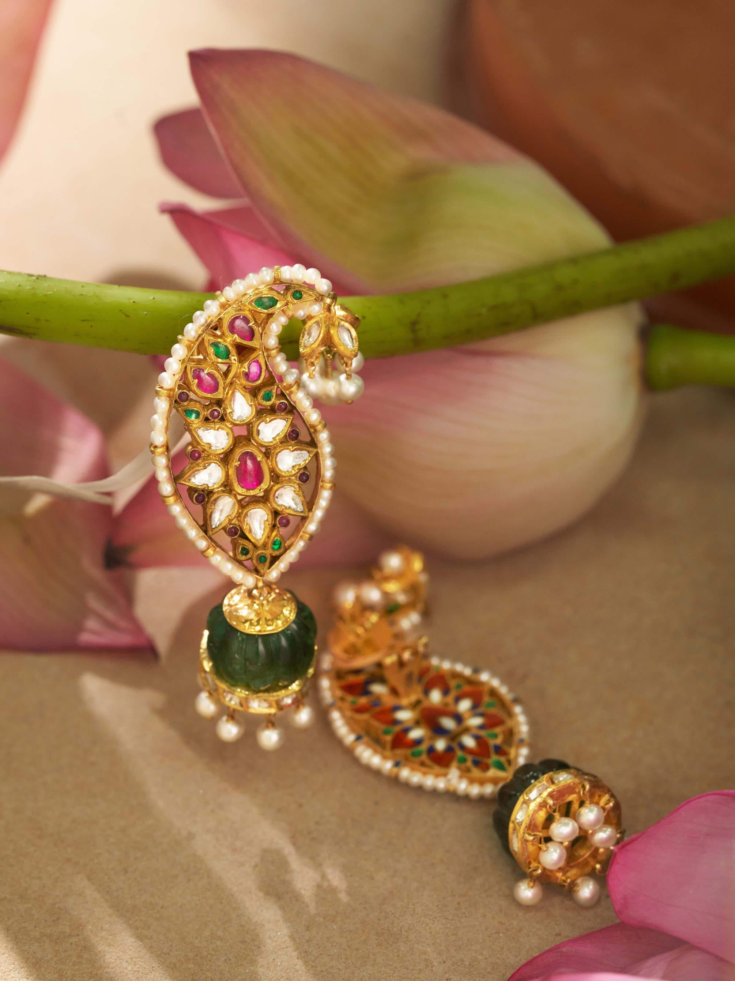 Lifestyle view showing Jadau gold jhumkas paired with traditional ethnic wear