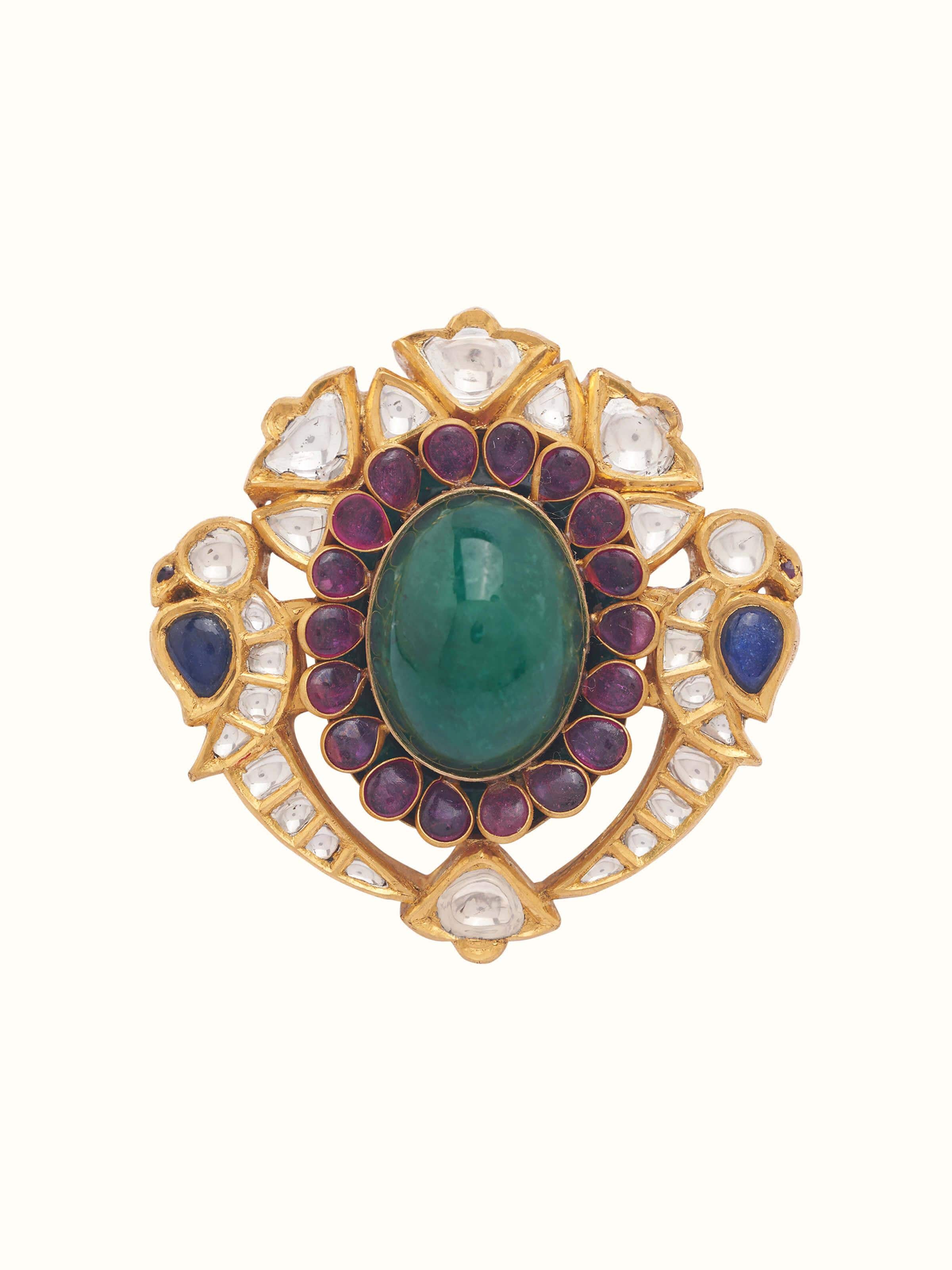 Front view of 18 karat gold ring with traditional Jadau setting and gemstone accents