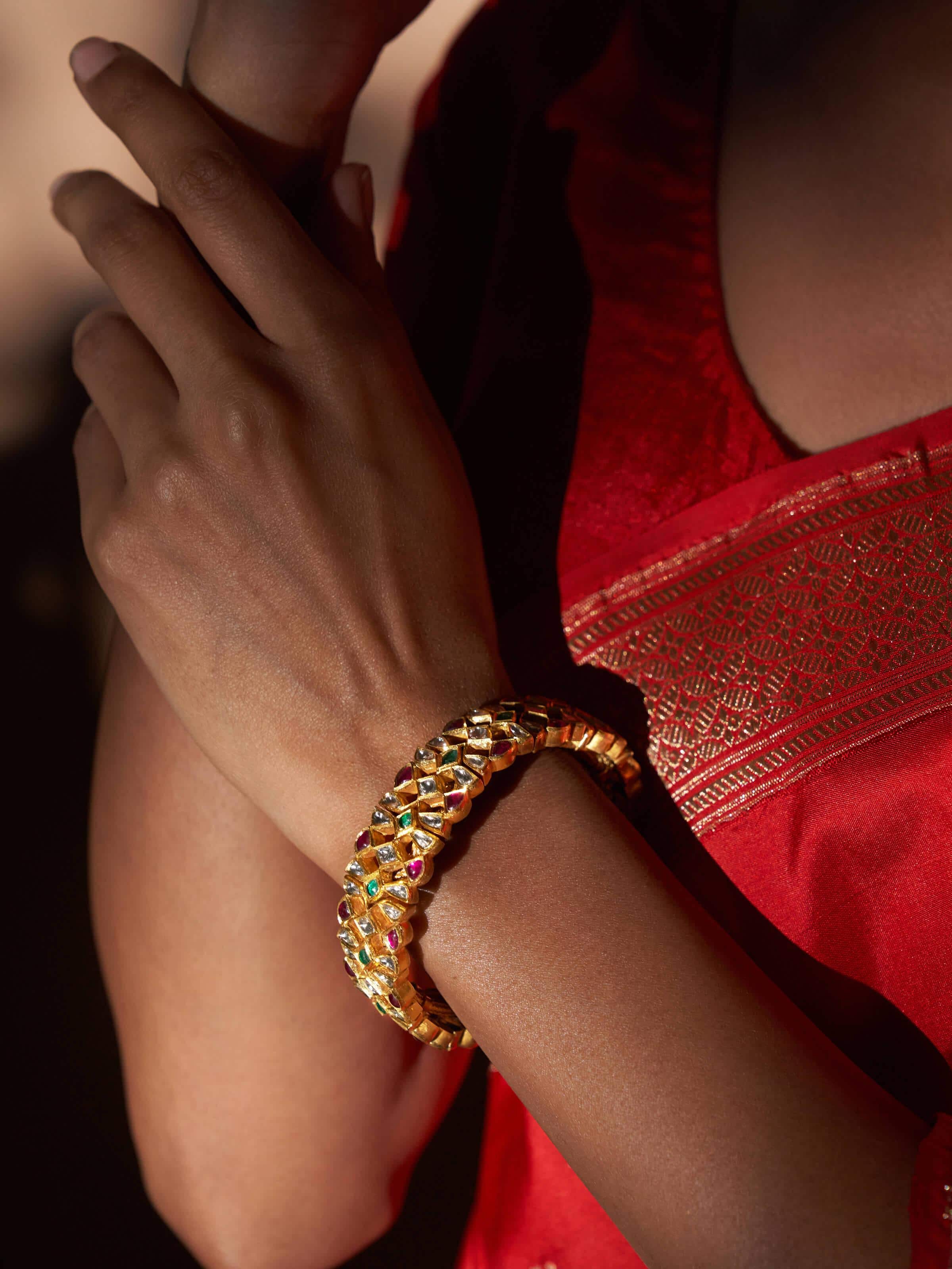 Close-up of Jadau 18 karat gold bracelet emphasizing fine detailing and luxurious finish