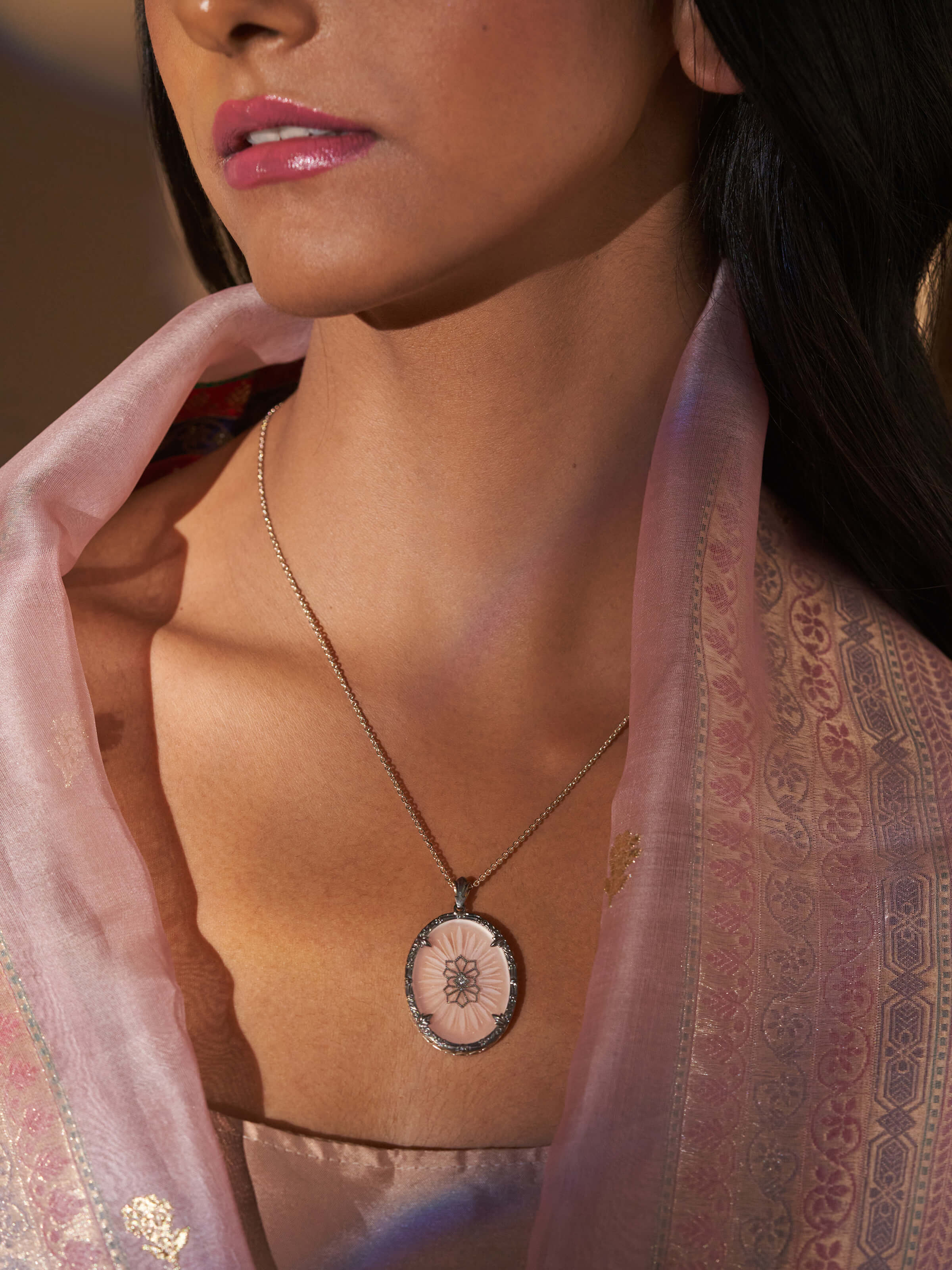 Side view of Lapidary 14 Karat Gold Pendant & Chain highlighting the elegance of the gold pendant and chain.