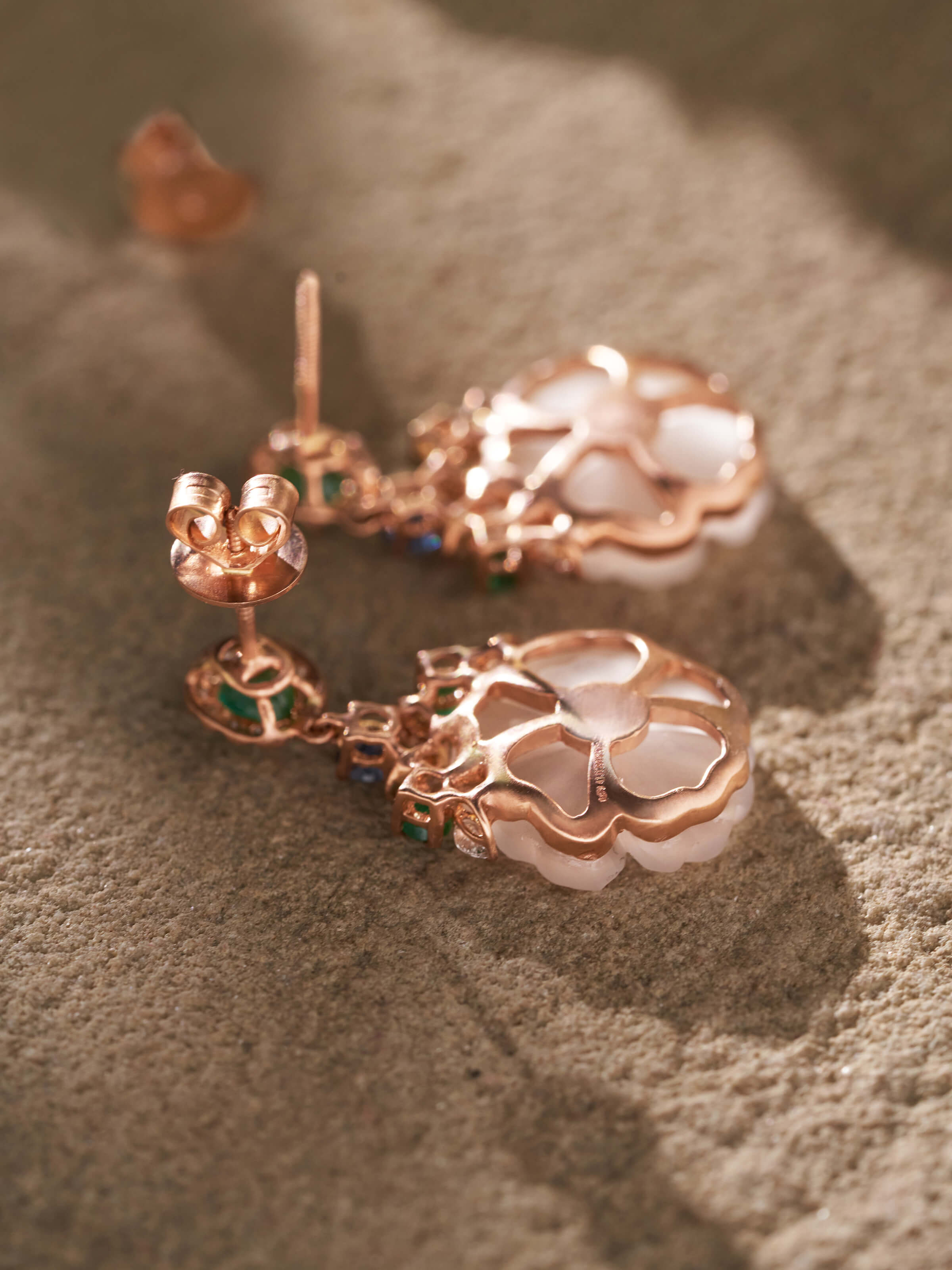 Detailed view of Lapidary 14 karat gold drop earrings highlighting fine craftsmanship and luxurious finish