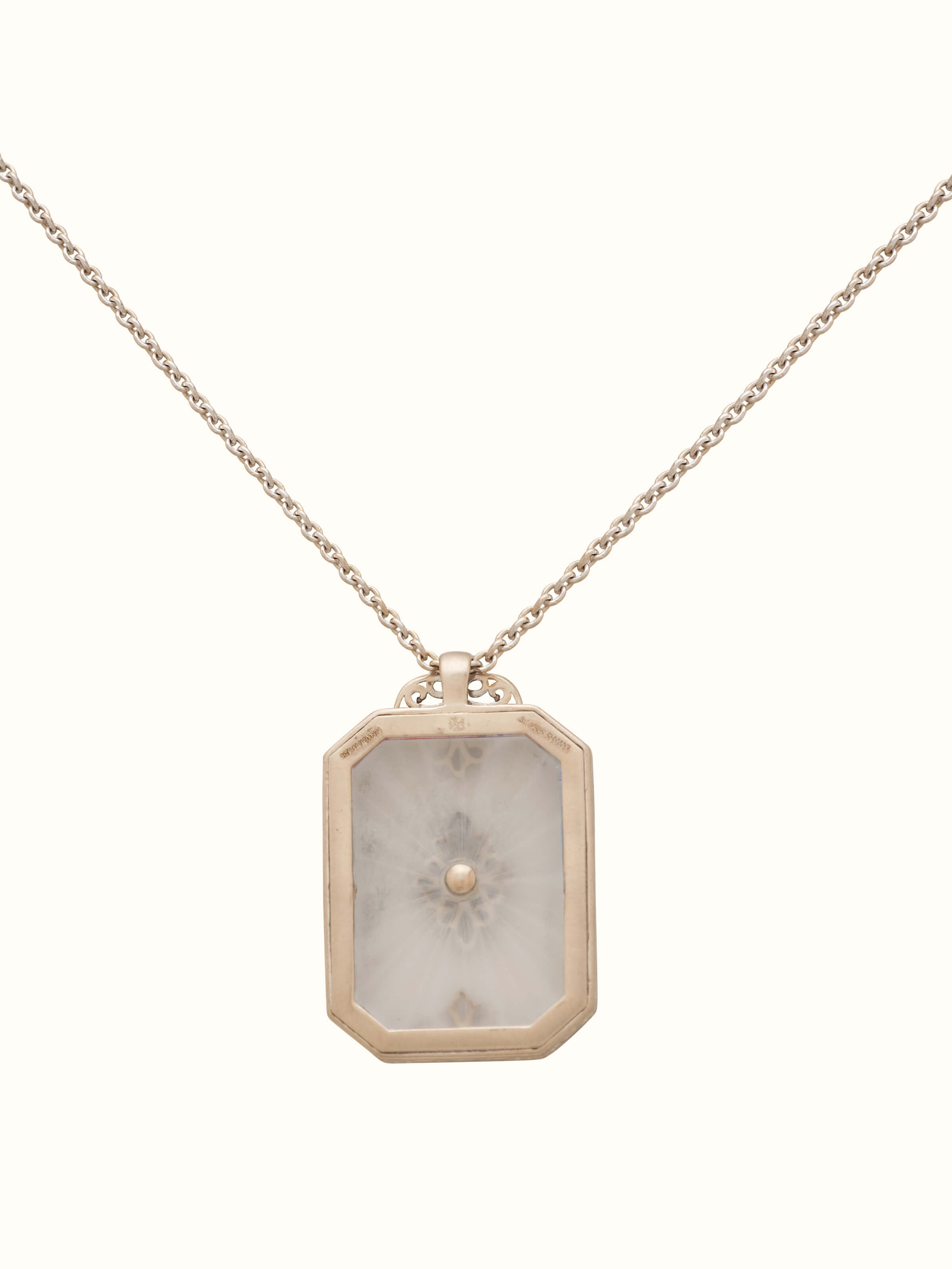 Detailed view of Lapidary 14 Karat gold pendant and chain emphasizing intricate craftsmanship.