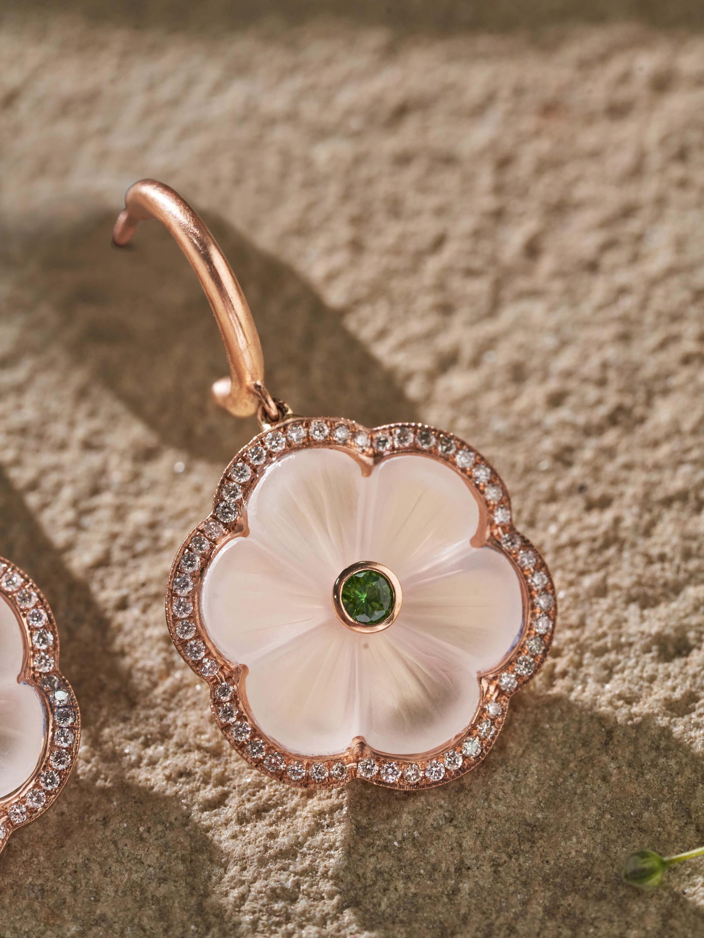 Angled view of Lapidary 14 Karat Gold Drop Earrings highlighting the luxurious gold design.