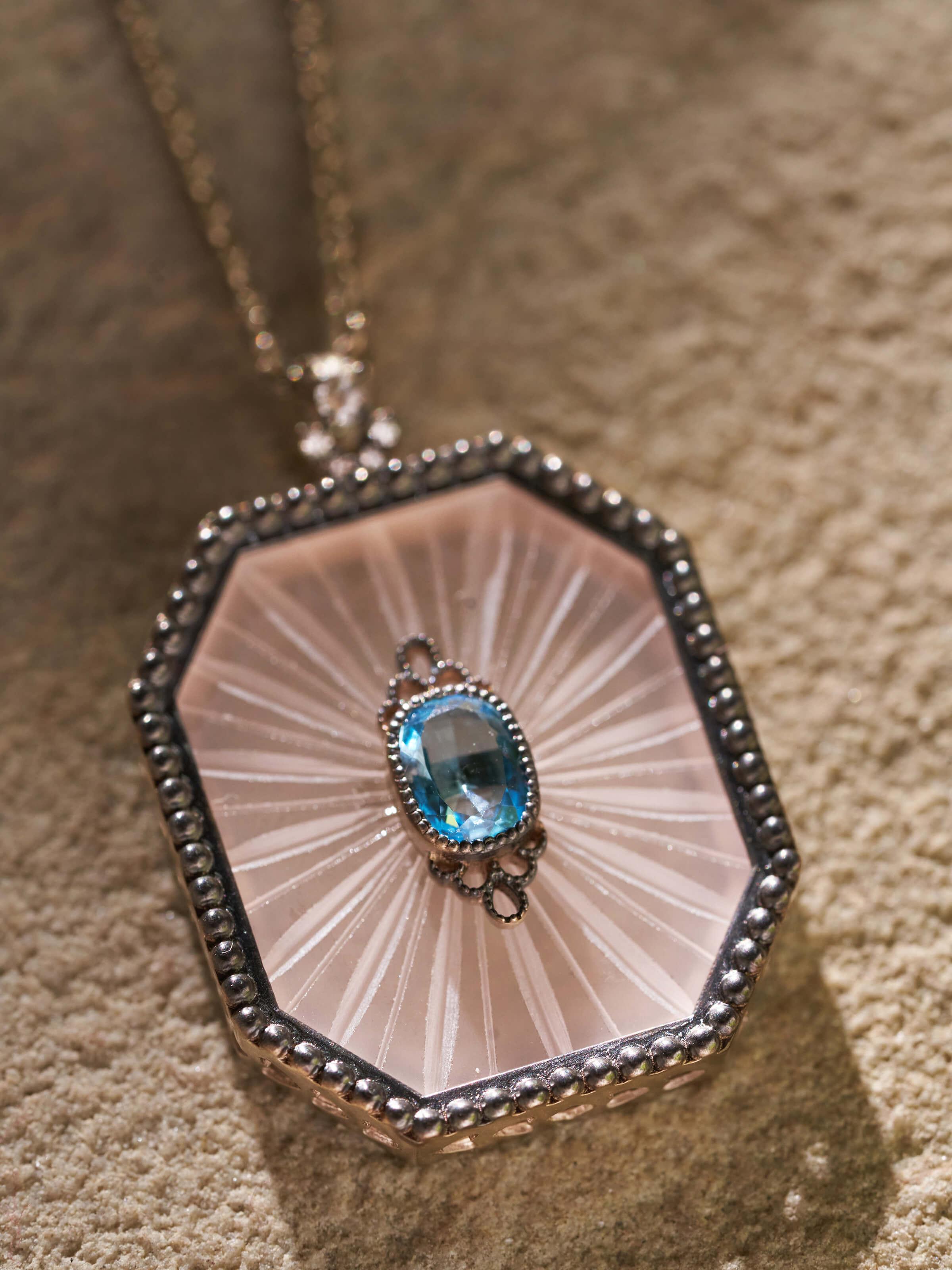 Second detail view of Lapidary pendant revealing craftsmanship and elegant clasp finish.