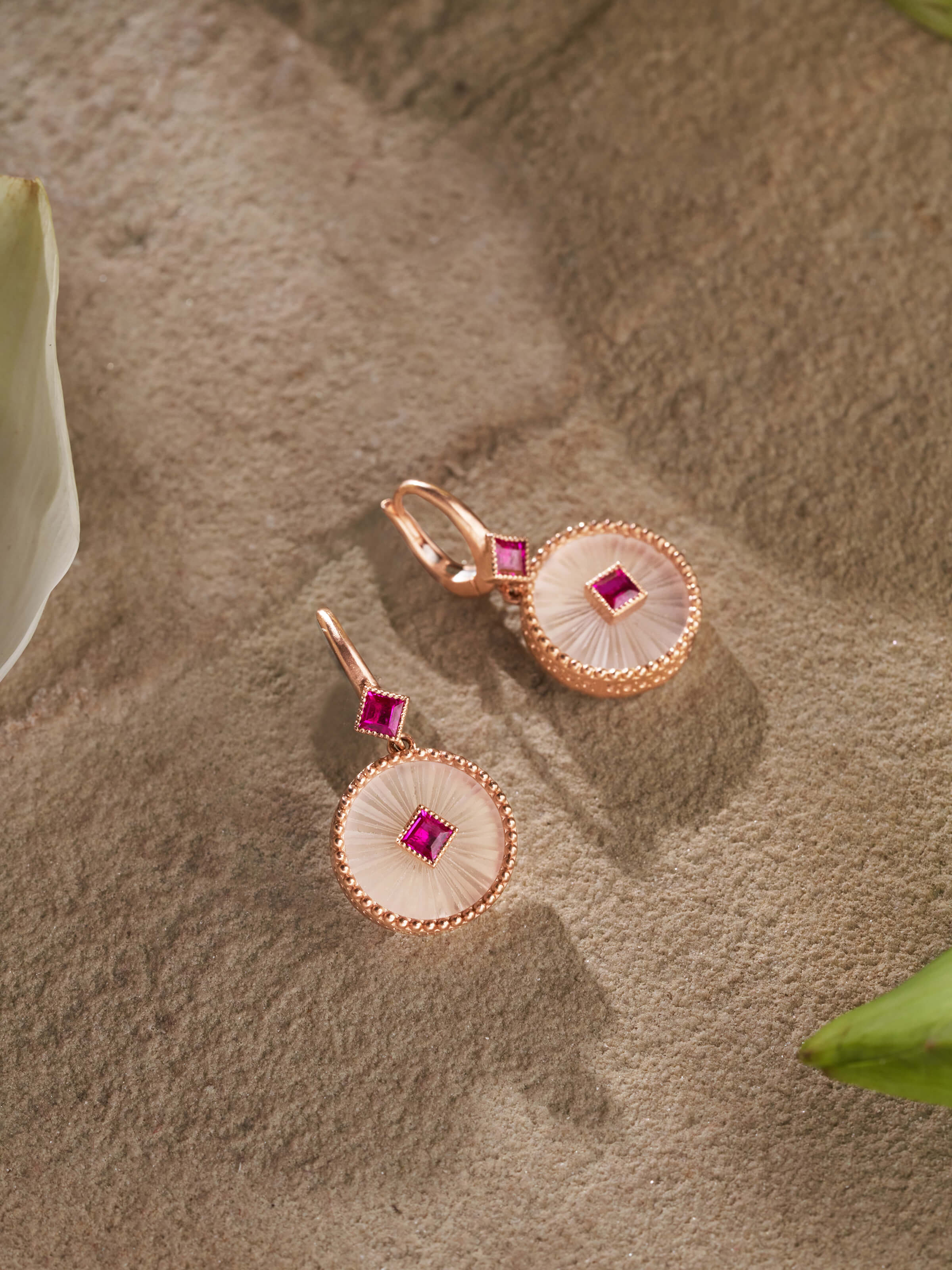 Side view of Lapidary 14 karat gold drop earrings highlighting their detailed craftsmanship and style