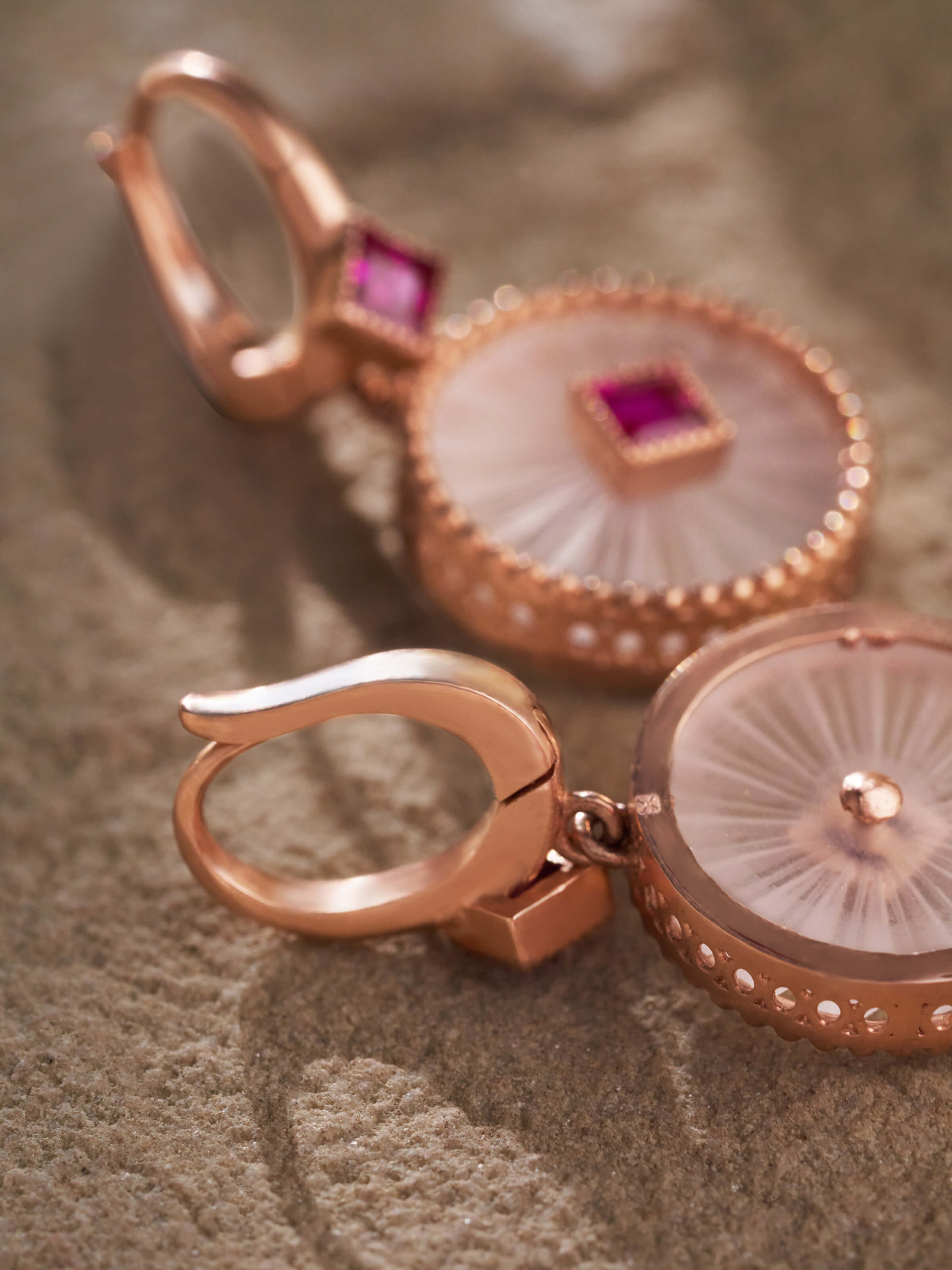 Detailed front view of Lapidary 14 karat gold drop earrings emphasizing their luxurious gold finish