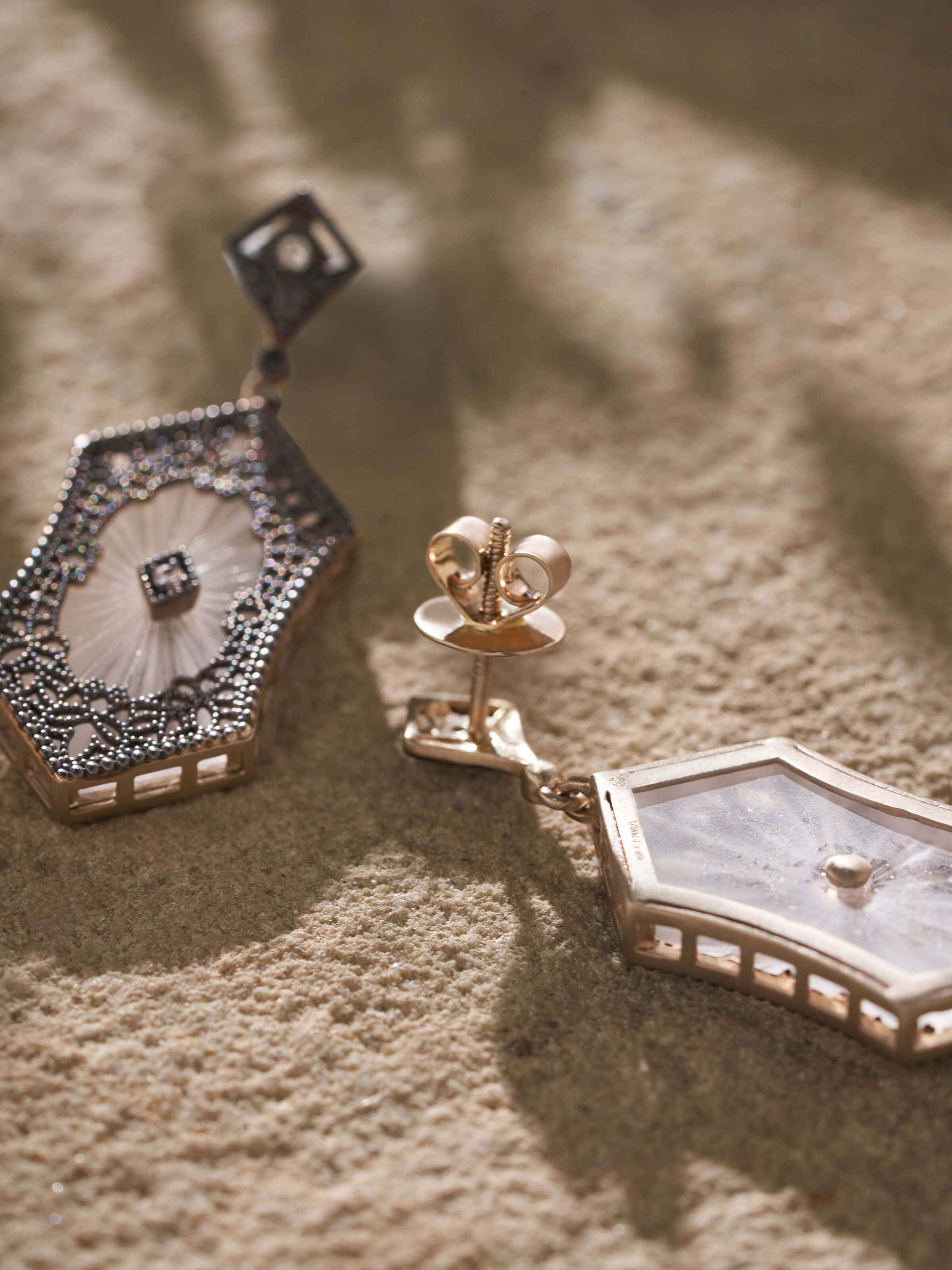 Detailed shot of Lapidary 14 karat gold drop earrings showcasing fine craftsmanship and elegant design