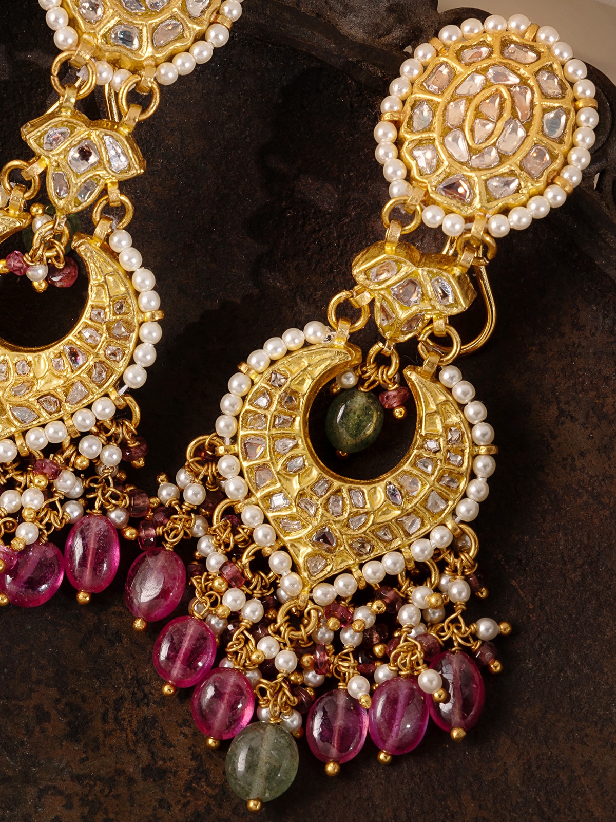 Detailed view of Thappa 22 karat gold drop earrings with emphasis on craftsmanship and gold finish