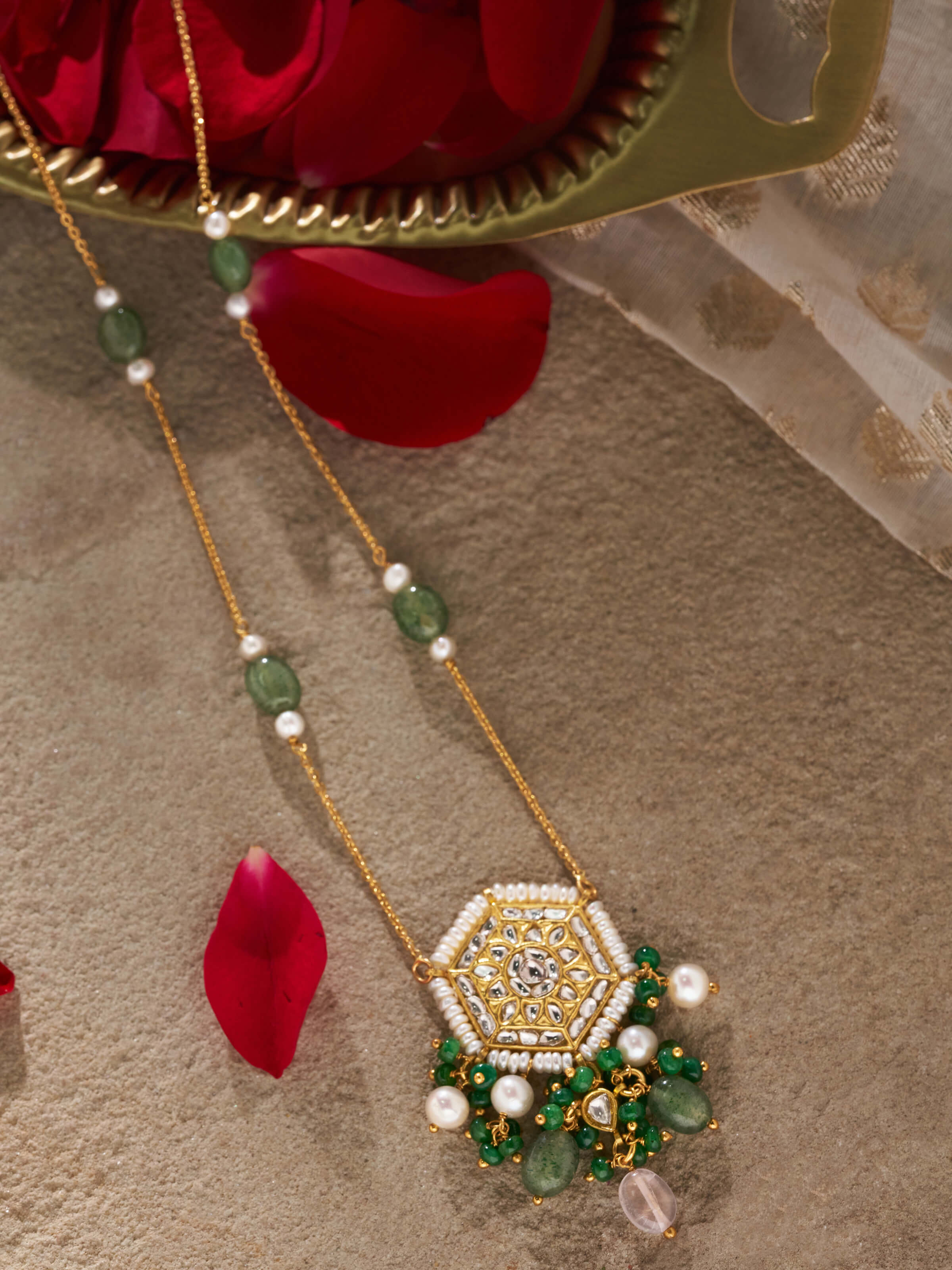 Lifestyle image featuring pendant worn with traditional Indian outfit