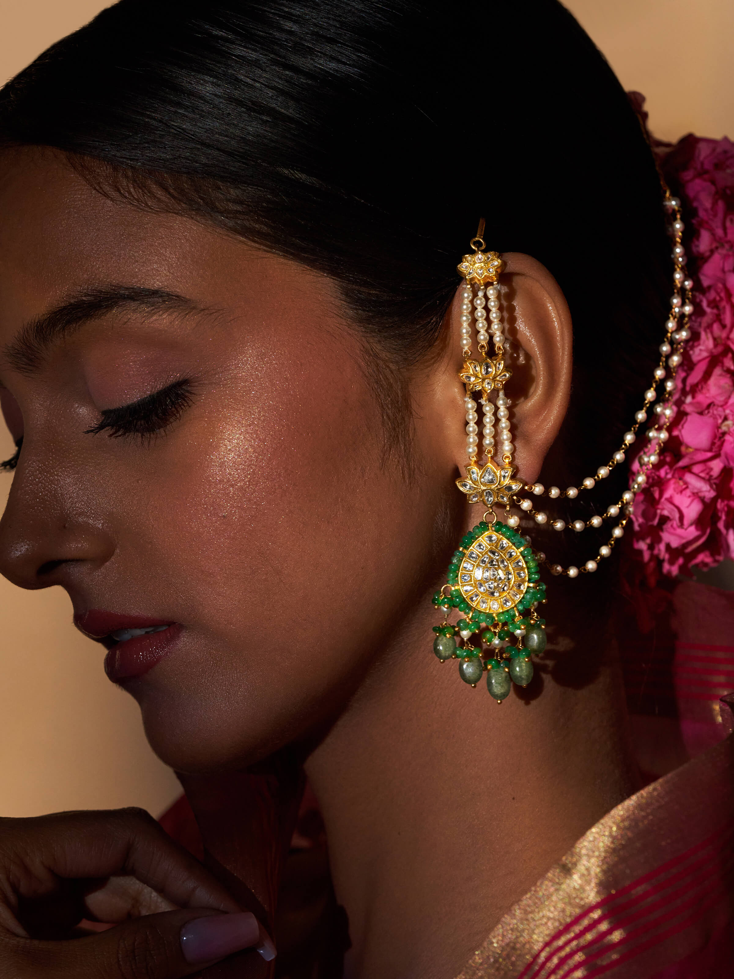 Detailed image showing the earrings’ texture and fine gold work