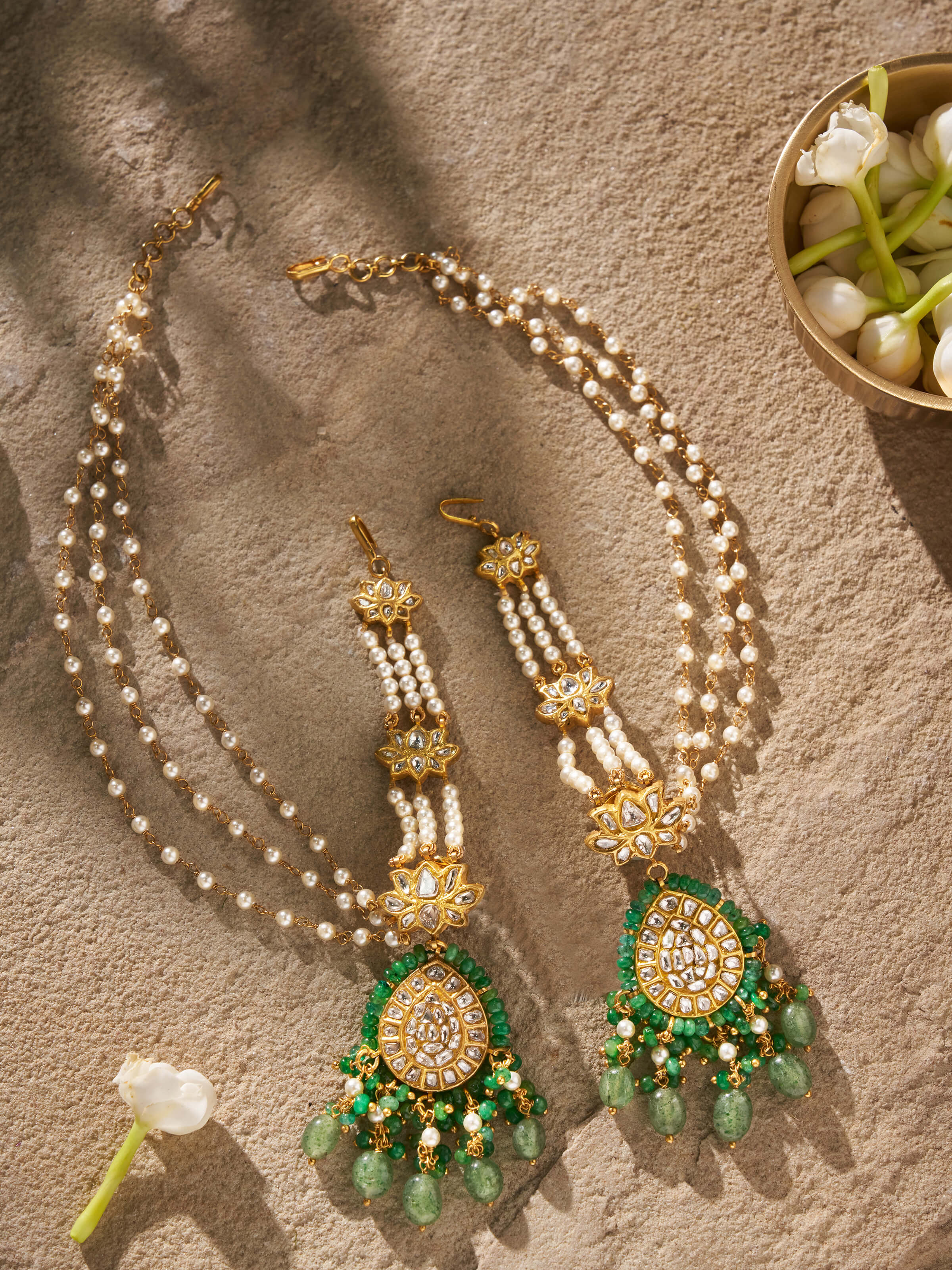 Angled shot emphasizing the earrings’ shape and elegant curves