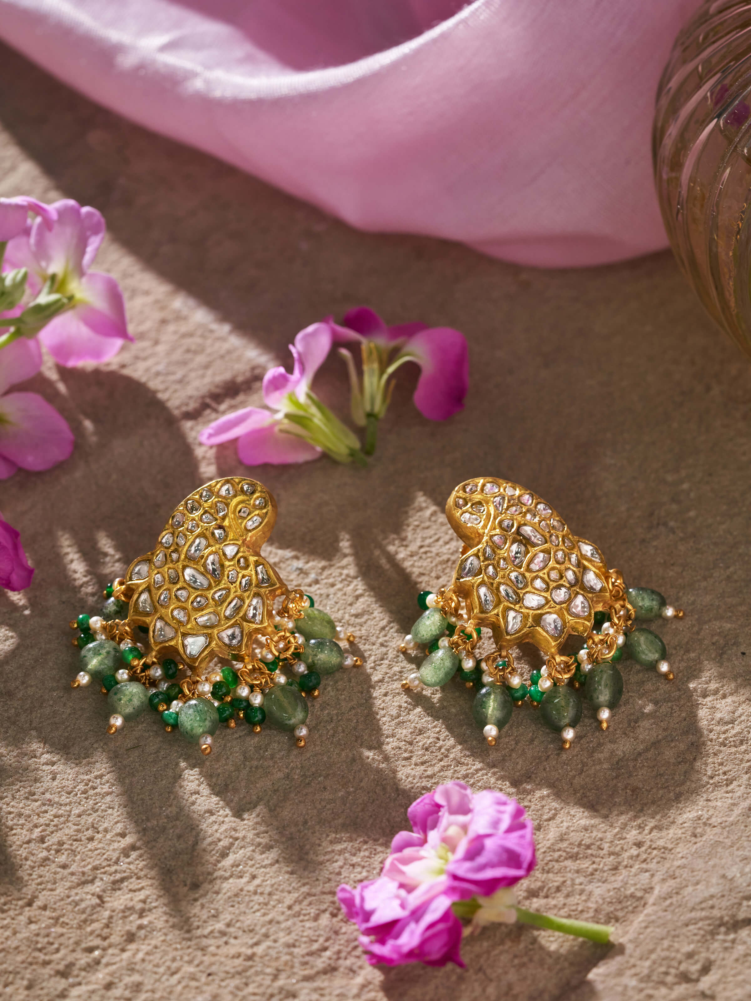 Close-up view of Thappa 22 Karat Gold Drop Earrings showing intricate gold patterns and the luxurious finish.