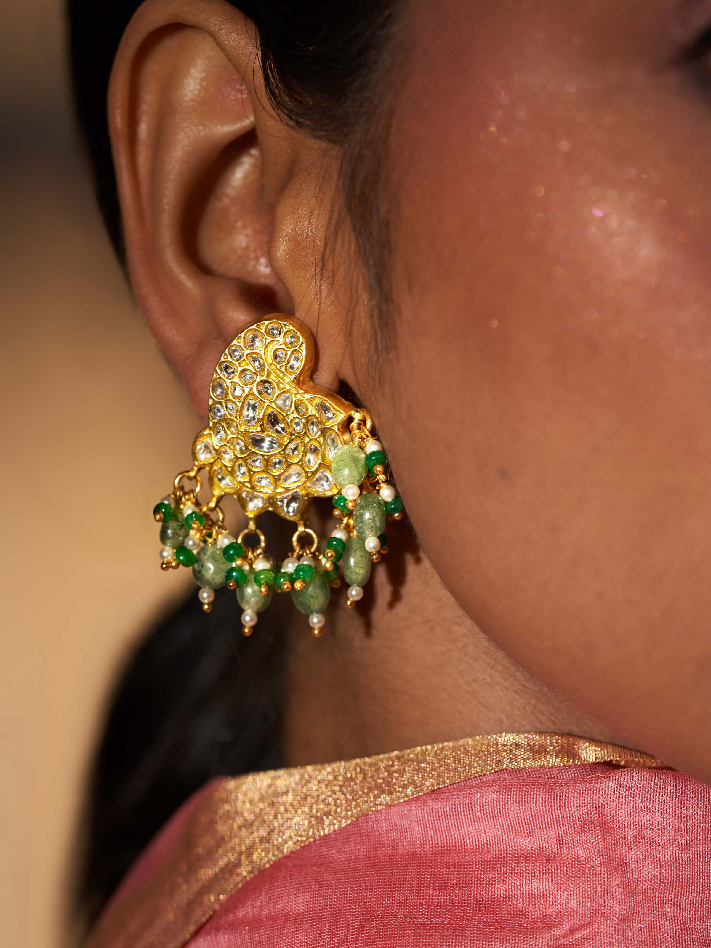 Detailed side view of Thappa 22 Karat Gold Drop Earrings emphasizing the elegant design and gold craftsmanship.