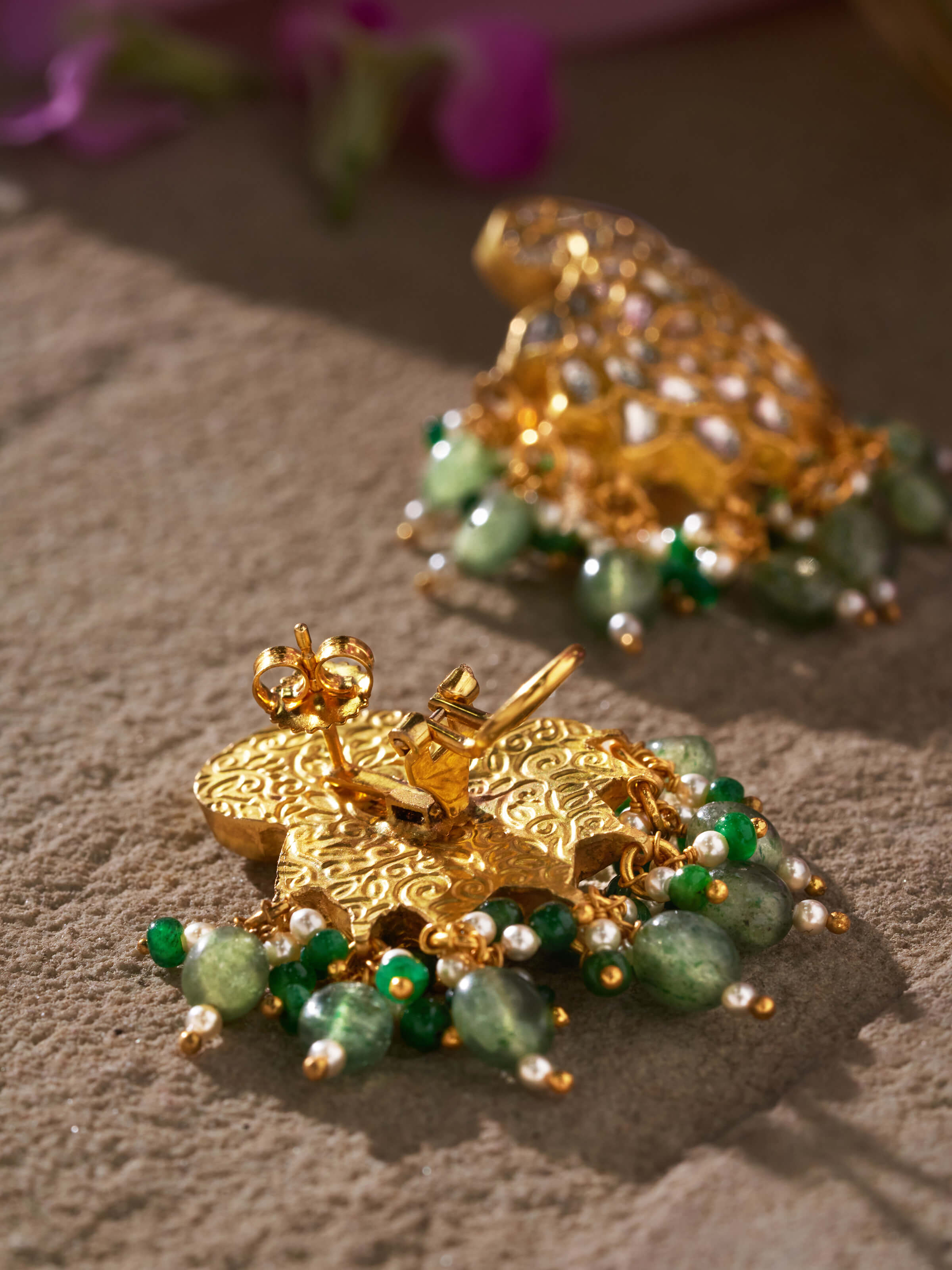 Back view of Thappa 22 Karat Gold Drop Earrings showing the secure fastening and smooth gold finish.