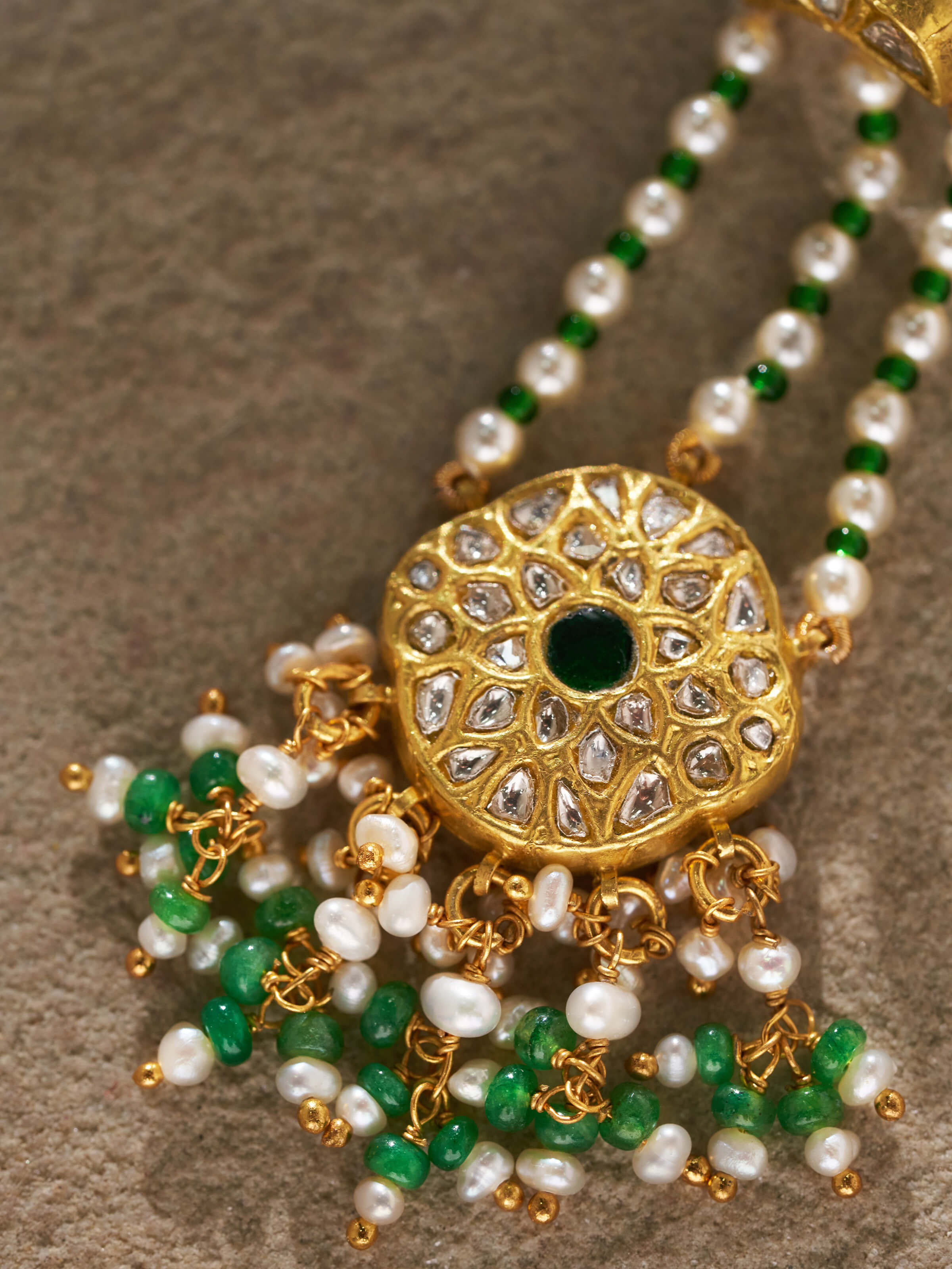 Detailed top view focusing on the gold patterns and fine artistry