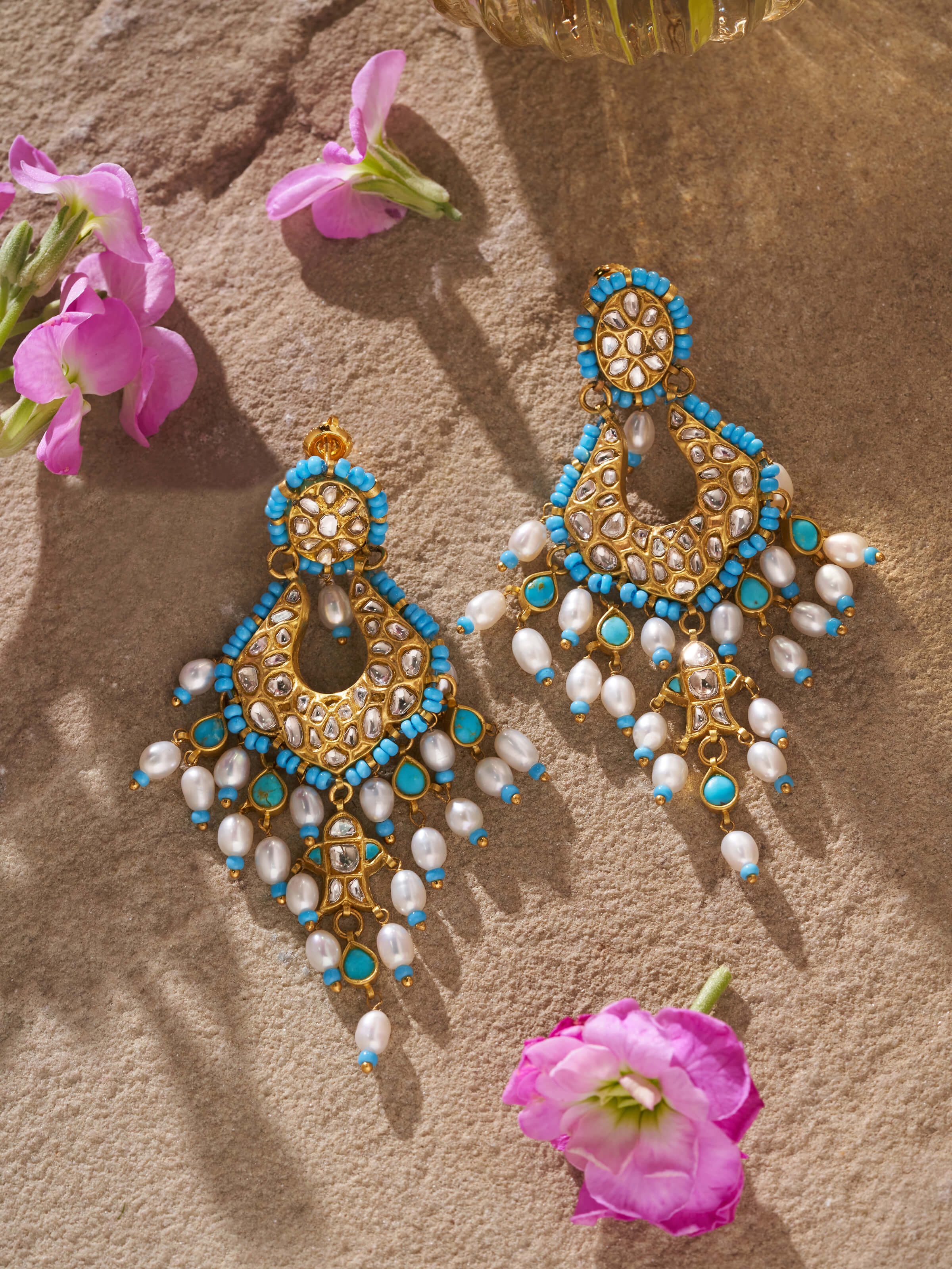 Detailed view of Thappa 22 Karat Gold Drop Earrings highlighting the intricate craftsmanship and gold sheen.