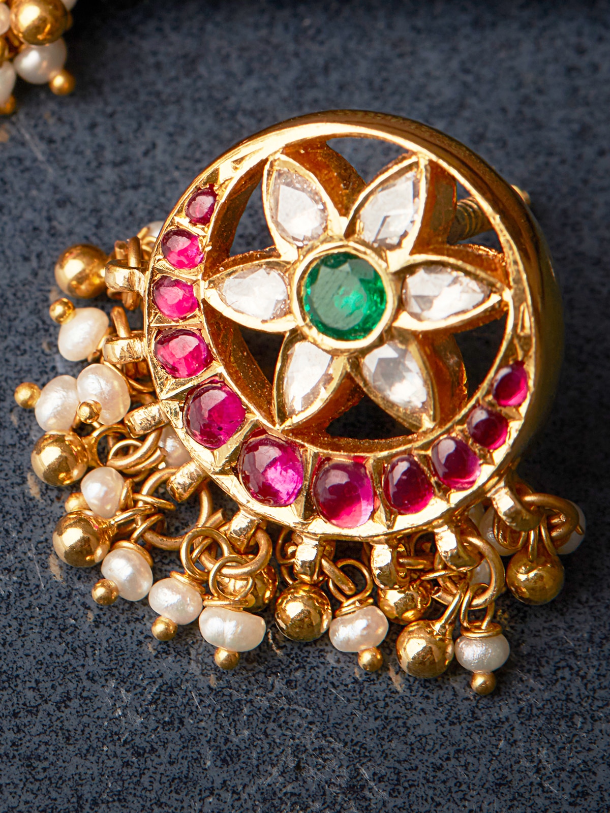 Detailed view of Kundala Velai 22 Karat Gold drop earrings showcasing their intricate design and fine gold finish.