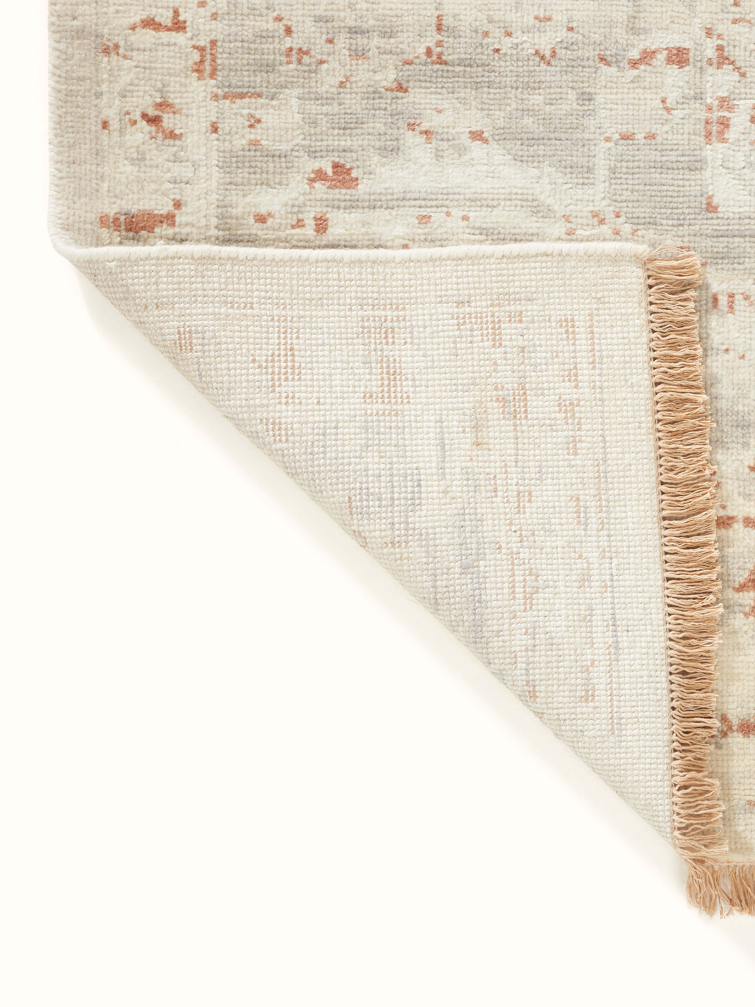 Overhead view of Distressed transitional beige rust Bhadohi wool & silk hand-knotted rug highlighting its large size and pattern.