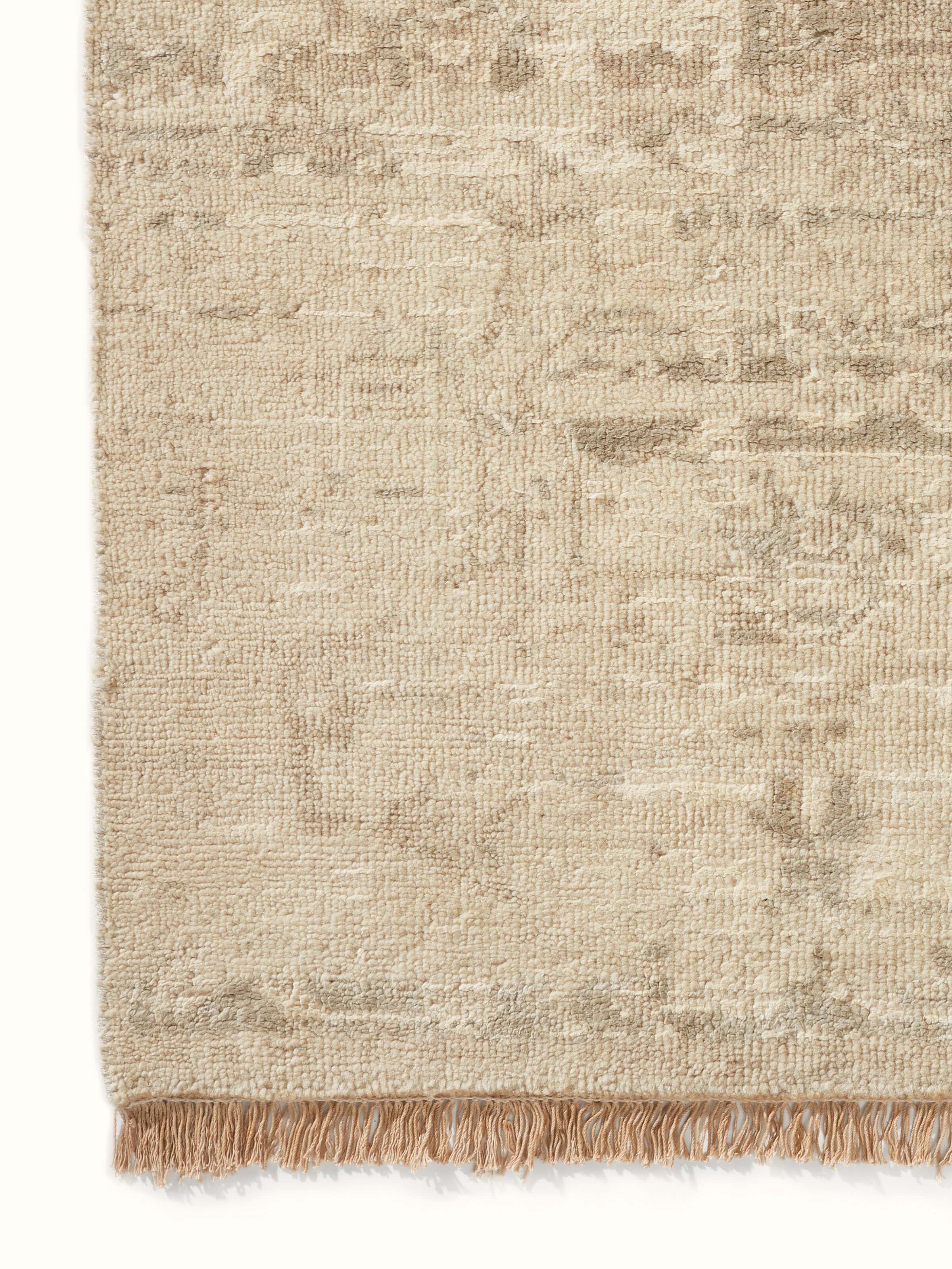 Angled view of the Distressed Transitional Beige Brown Bhadohi Wool & Silk Hand-Knotted Rug, capturing the rug’s pattern and color transition.