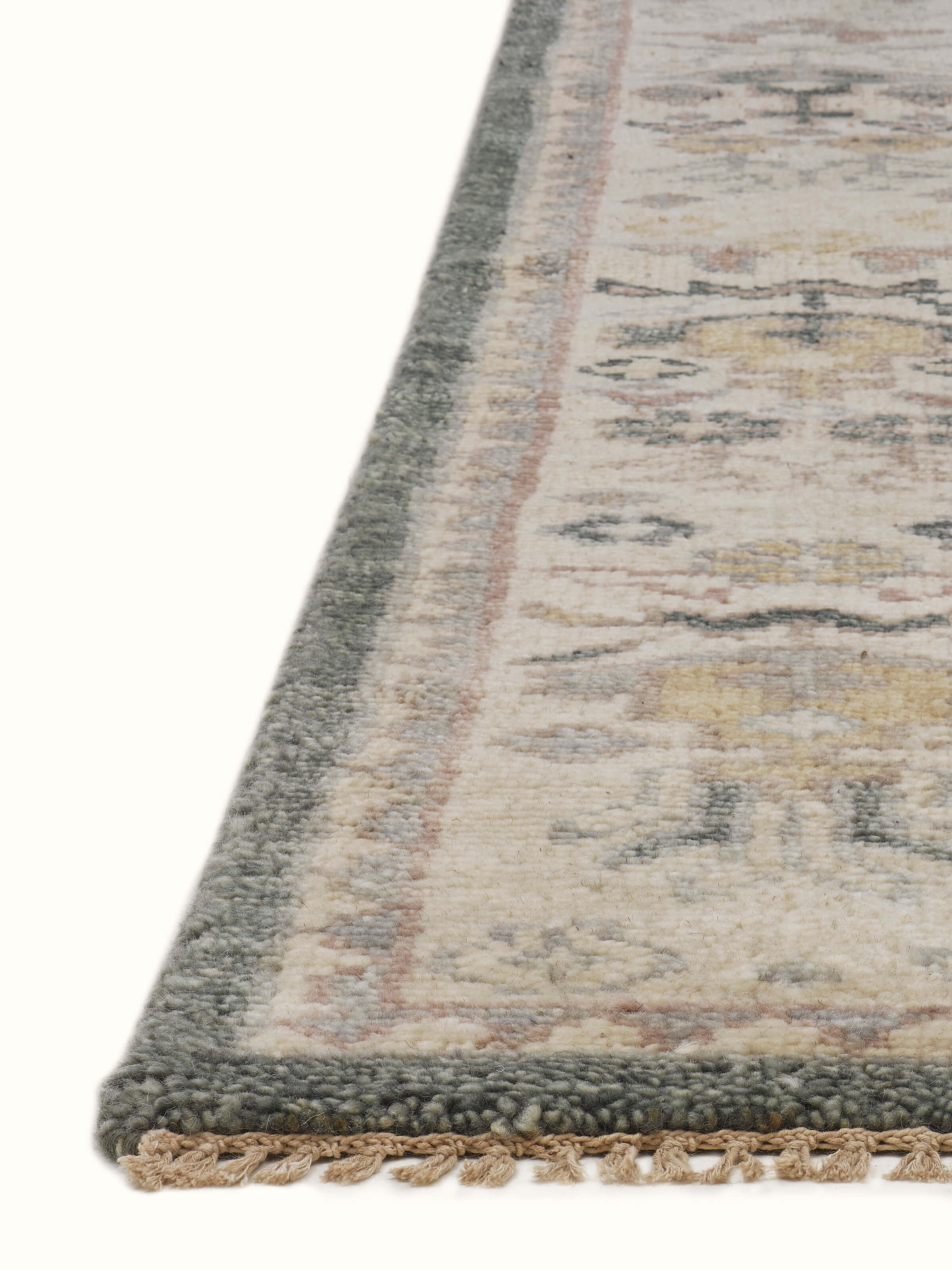 Detailed view of Oushak traditional grey Bhadohi wool hand-knotted rug kharad highlighting the rug's intricate design.