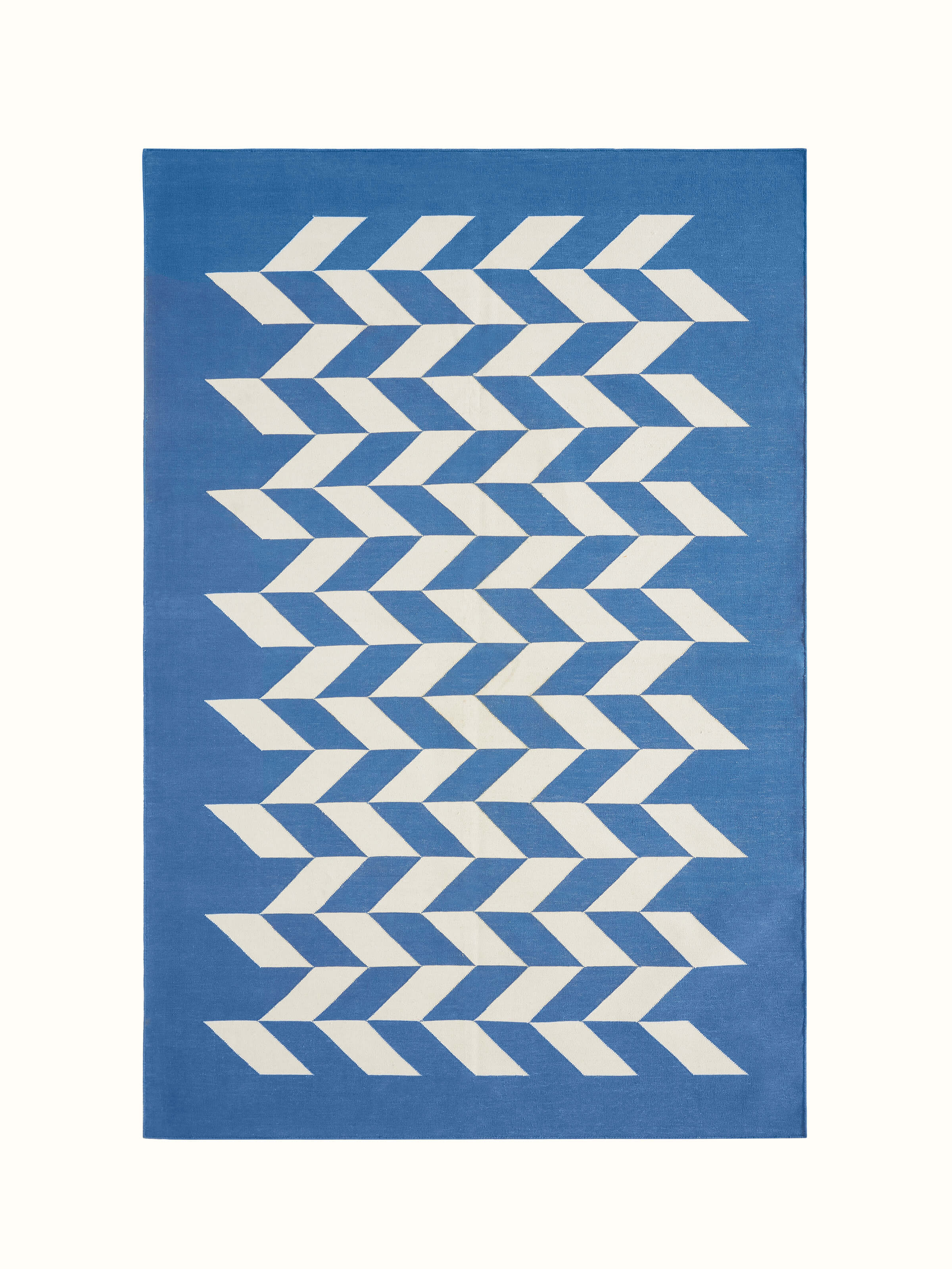 Modern geo chevron blue ivory Lawan cotton Panja dhurrie, displaying the full design and color scheme
