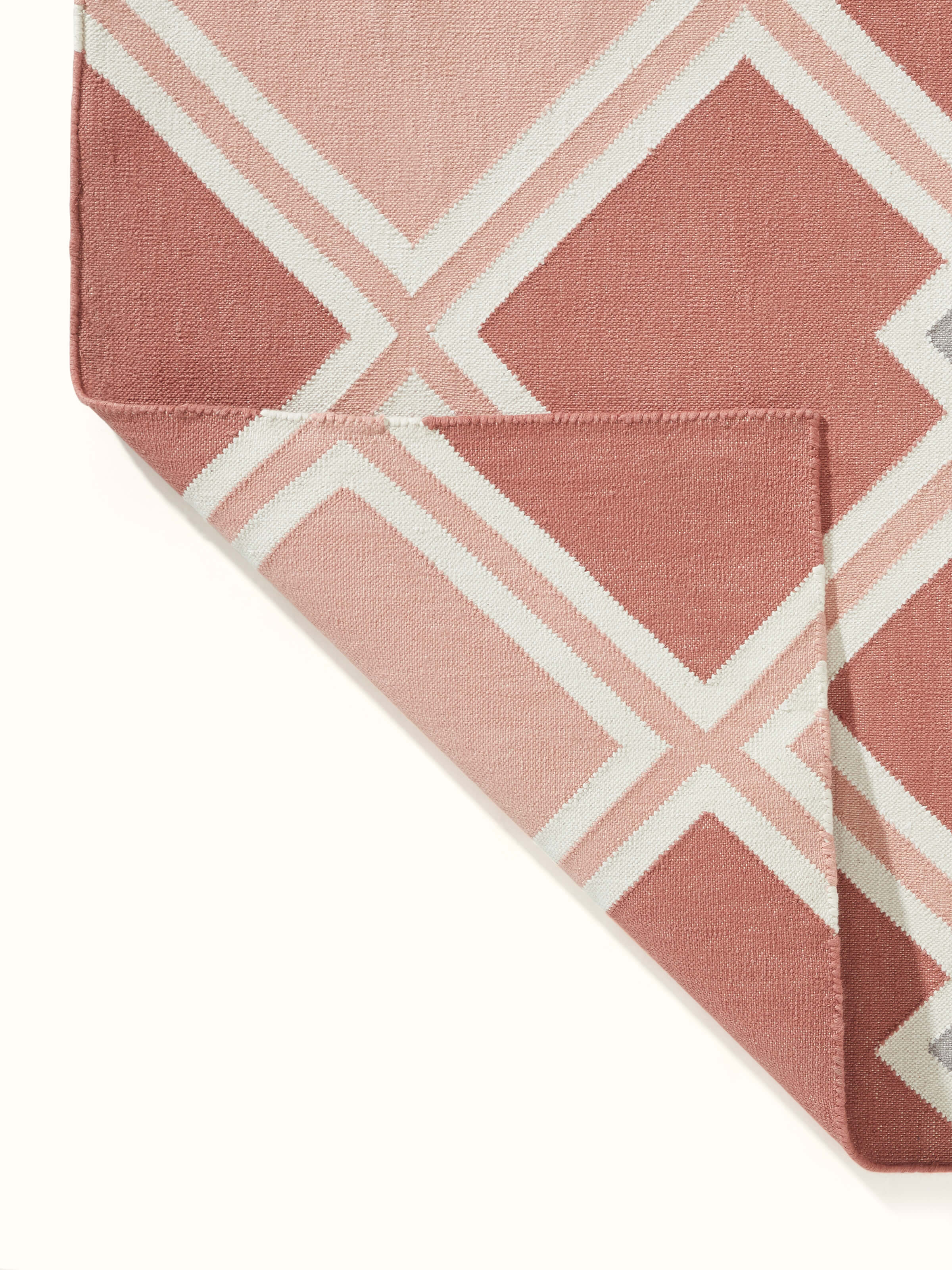 Full view of Modern geo diamond red blush lawan cotton panja dhurrie highlighting its geometric design and color scheme.