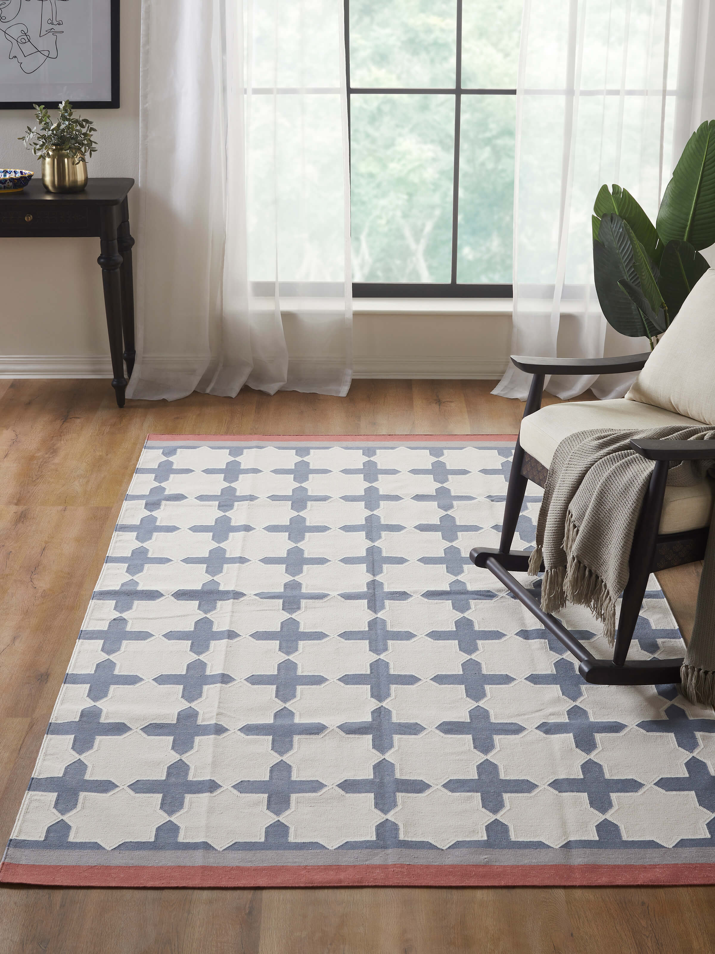 Close-up of Modern geo jharokha grey blue lawan cotton panja dhurrie highlighting the geometric patterns and color contrast.