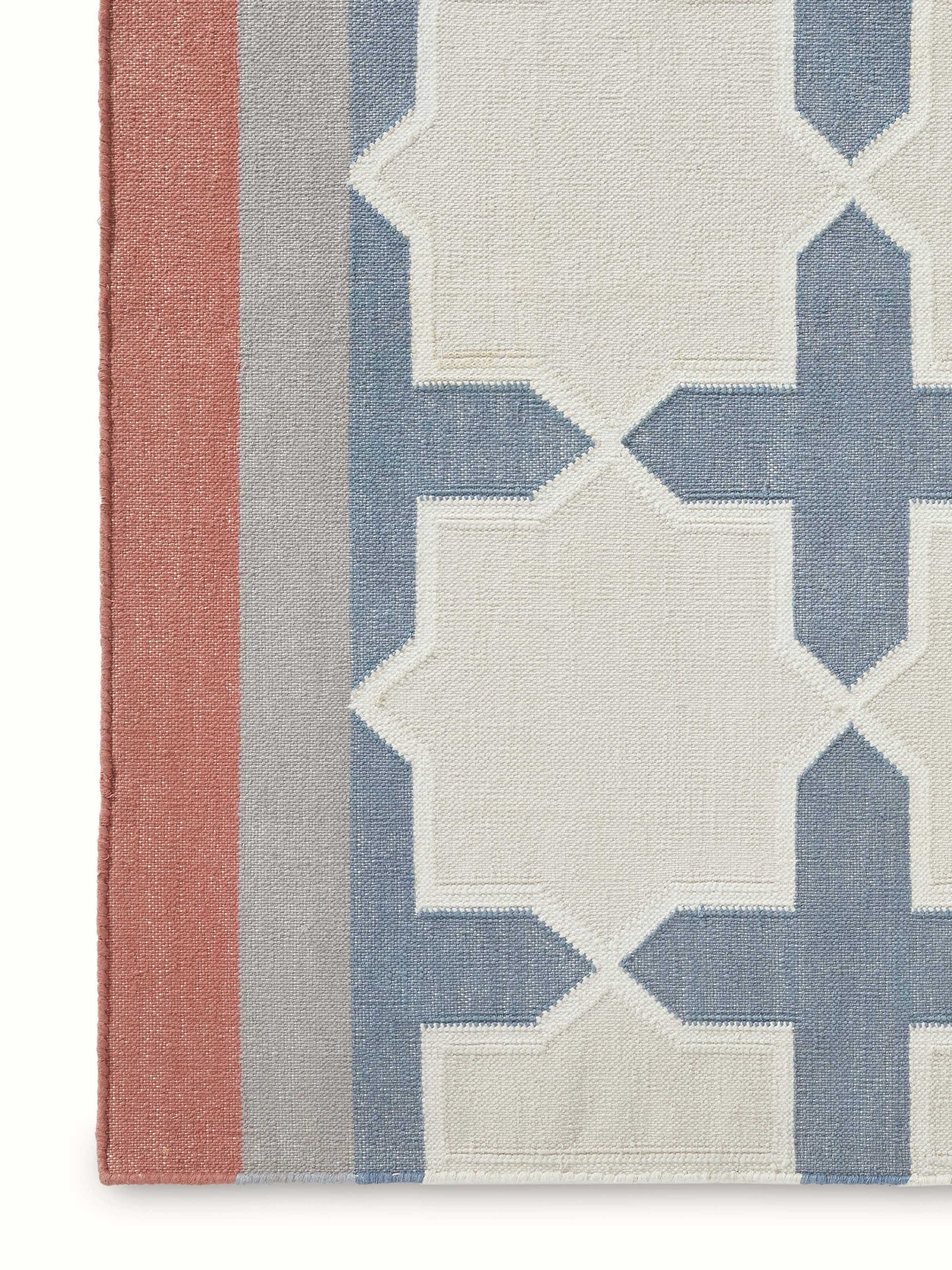 Detailed view of Modern geo jharokha grey blue lawan cotton panja dhurrie focusing on the texture and geometric patterns.