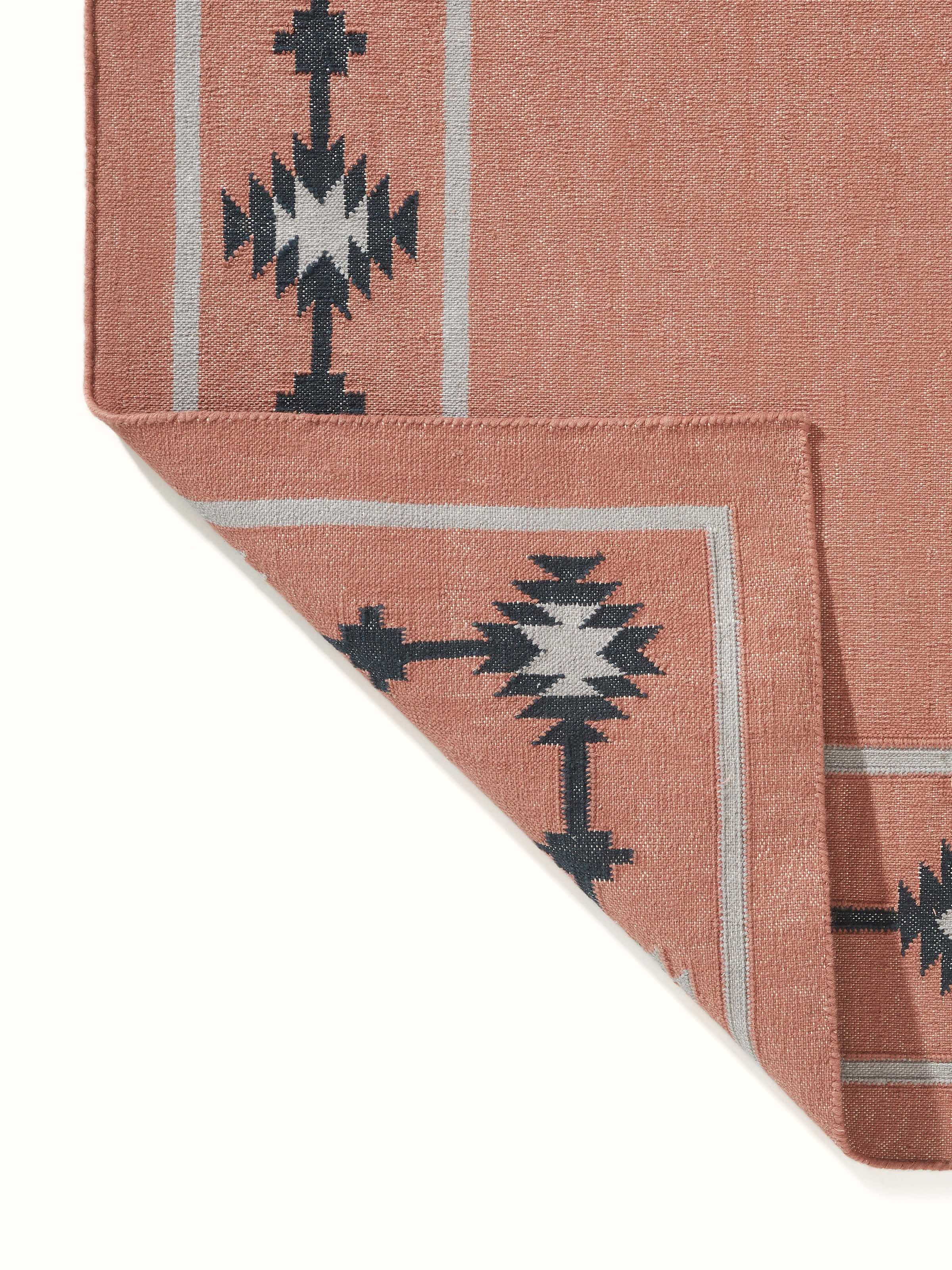 Full view of Traditional Kilim Rust Lawan Cotton Panja Dhurrie, showing the complete rug layout with its pattern.
