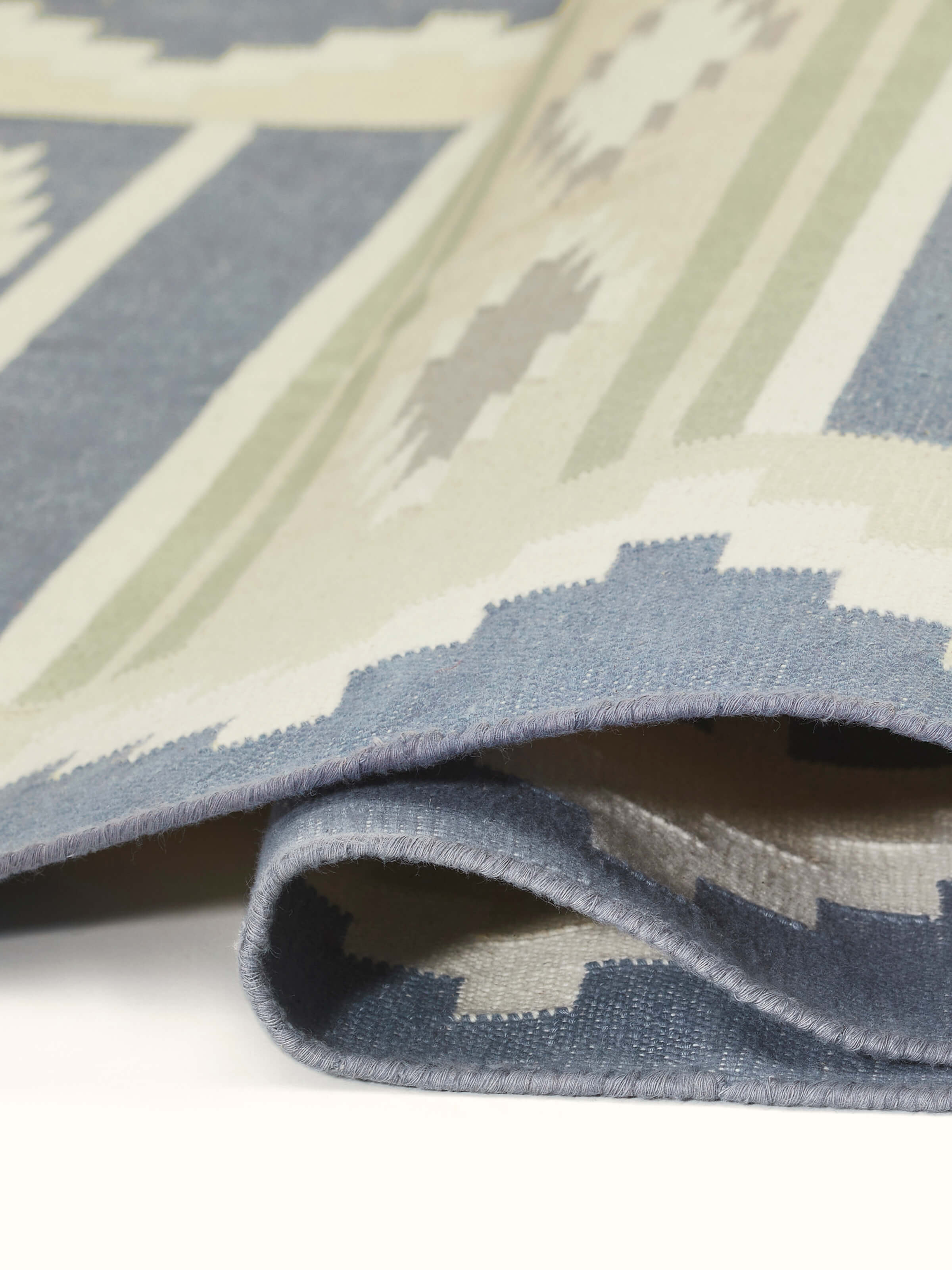 Close-up of Modern geo blue lawan cotton panja runner focusing on the geometric print and fabric details