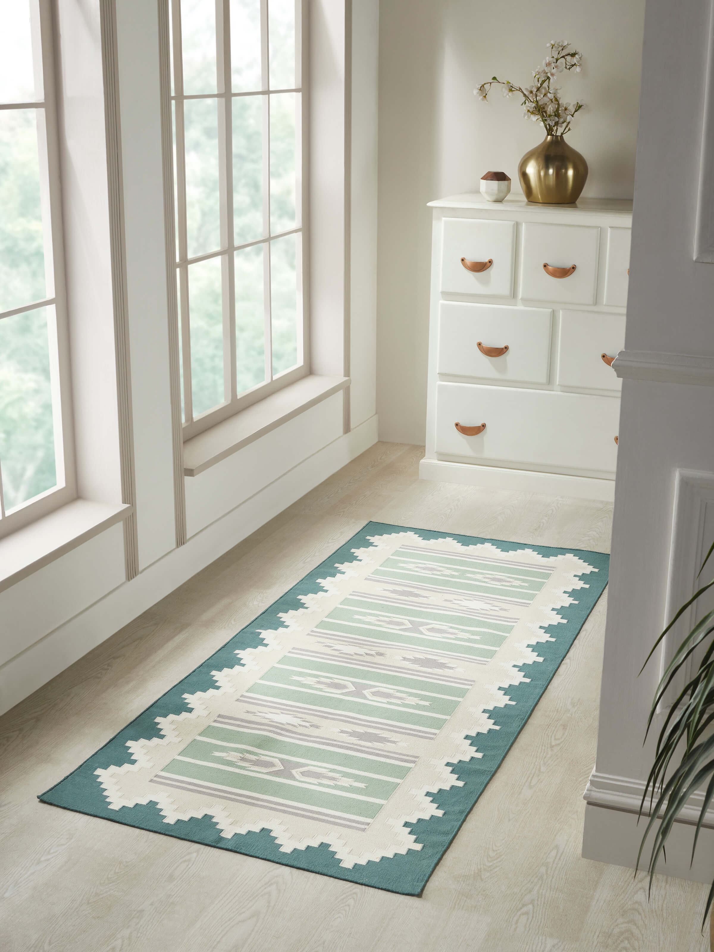 Detailed view of the Modern Geo green lawan cotton panja runner, showing geometric patterns