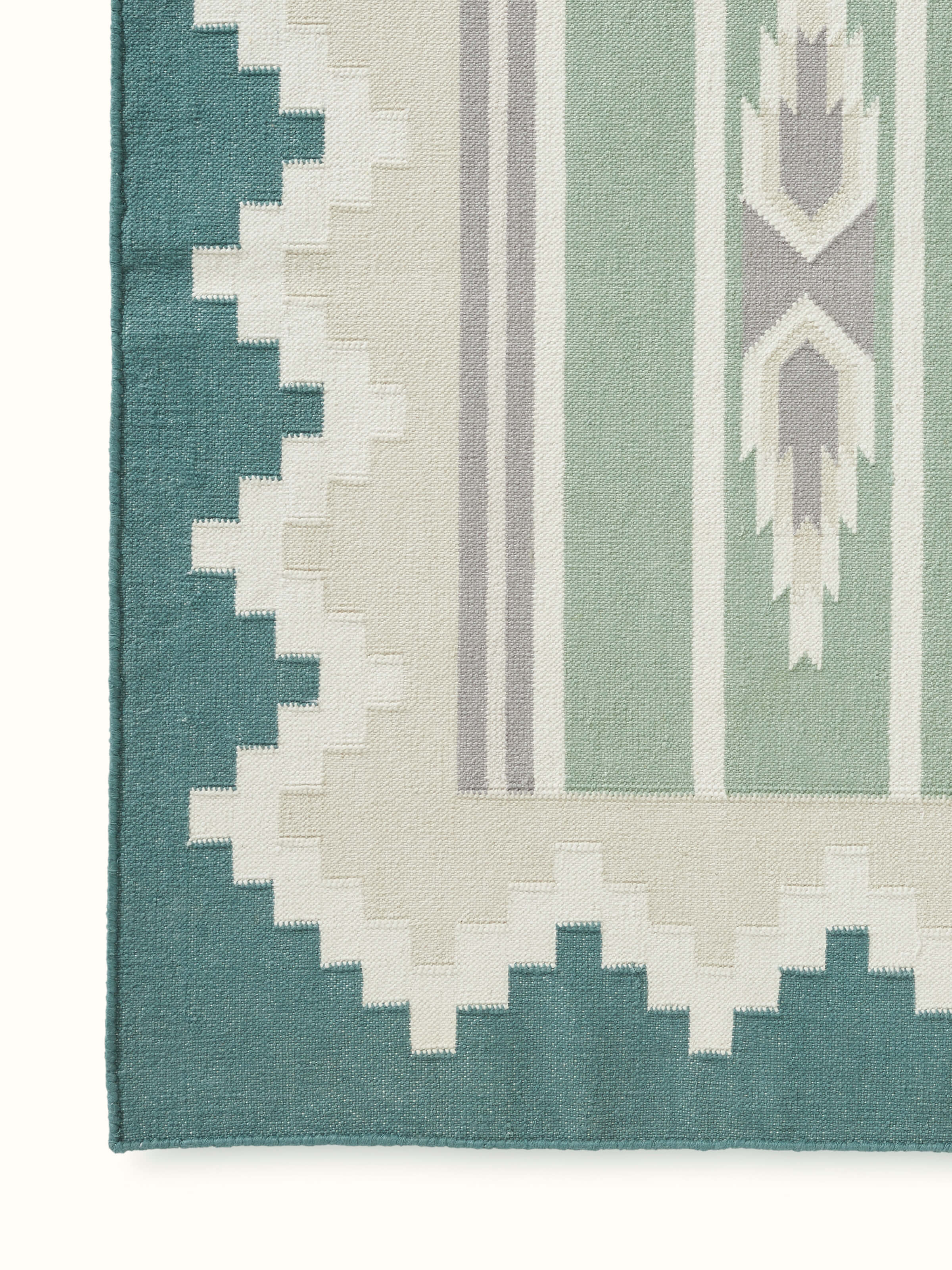 Detailed side view of Modern Geo green lawan cotton panja runner