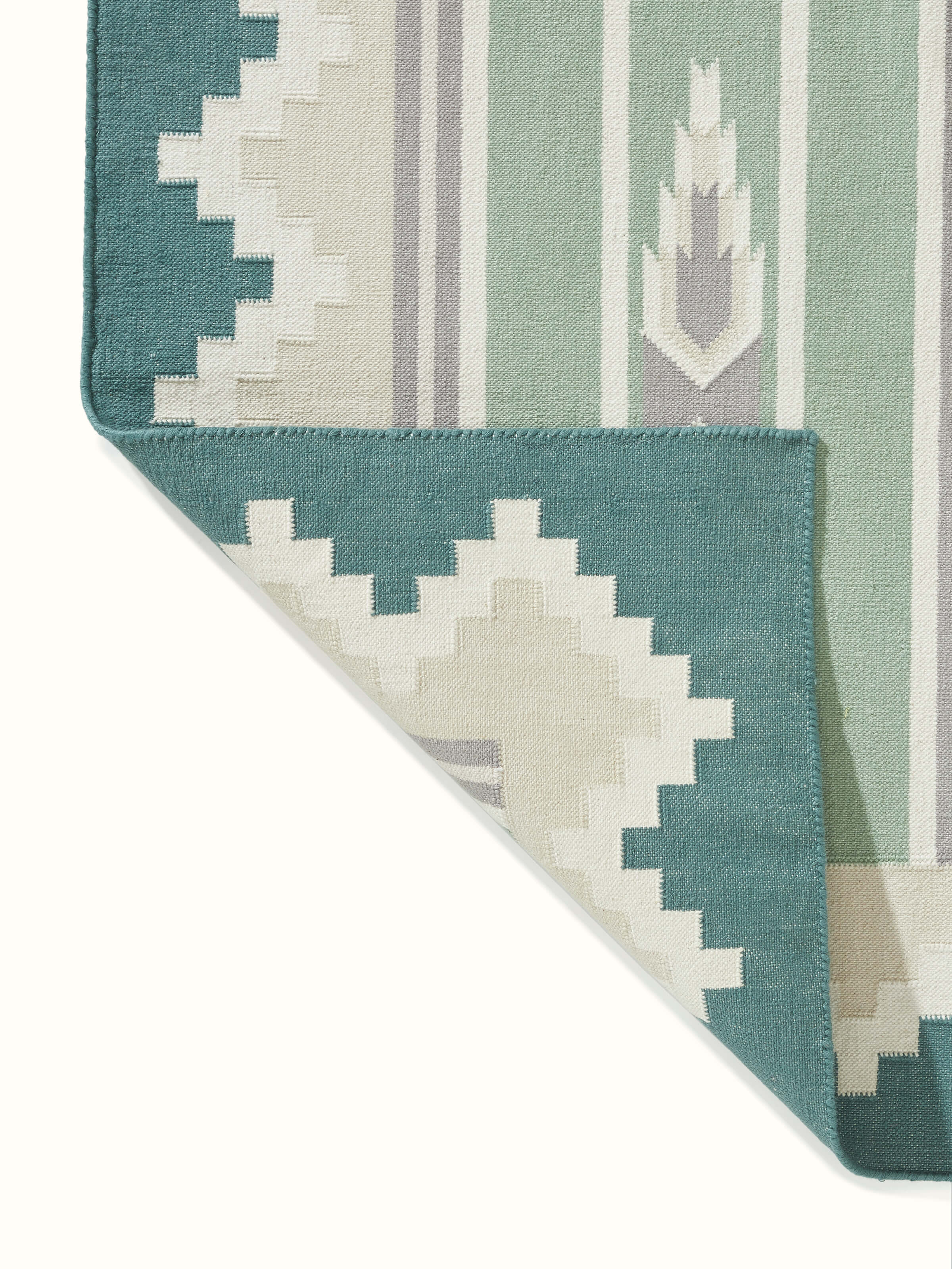 Full view of Modern Geo green lawan cotton panja runner in a room setting