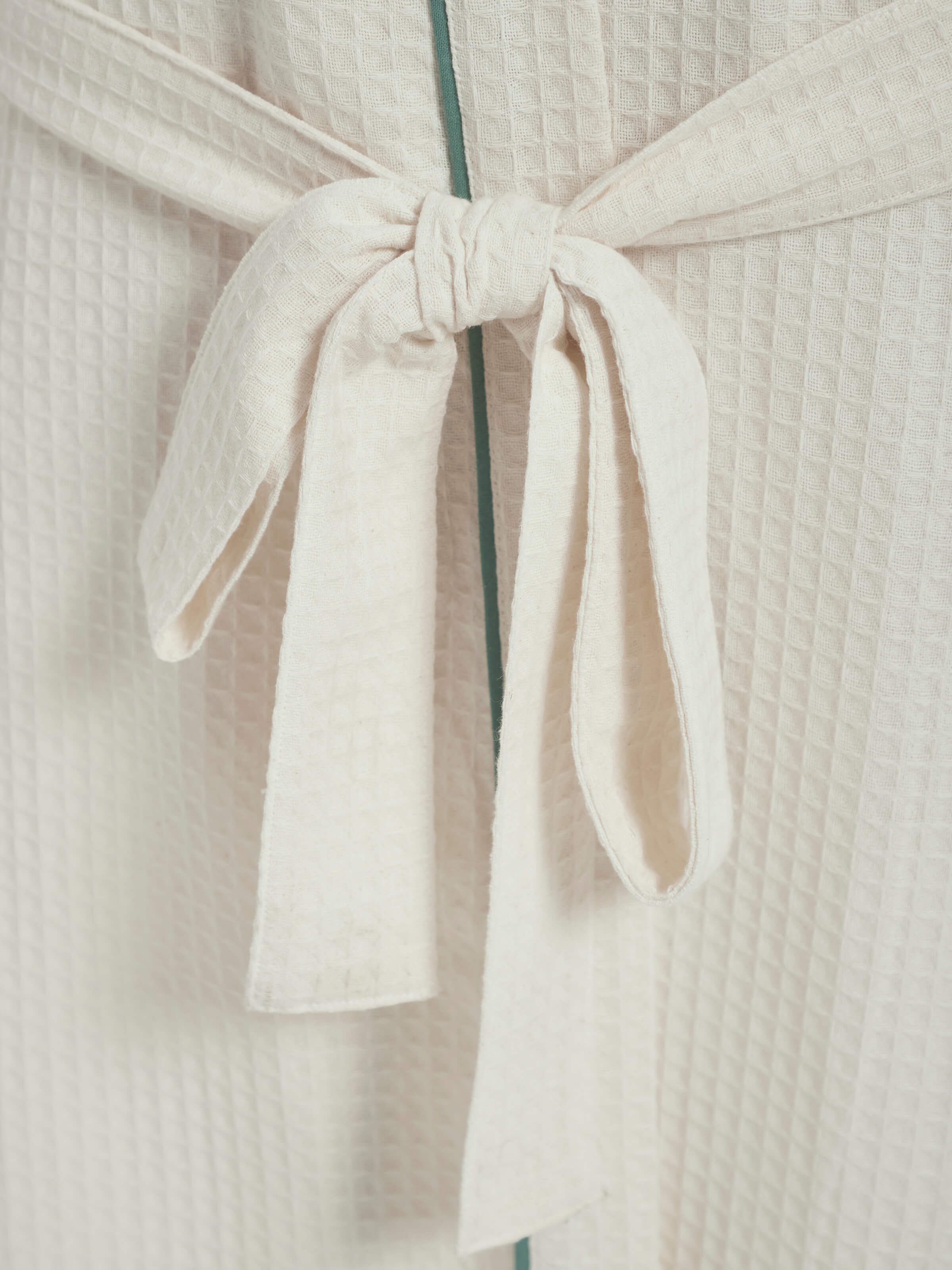 Angled view of Palampore Buta Yellow & Green Floral Cotton Sanganeri Block Printed Bathrobe highlighting the overall print