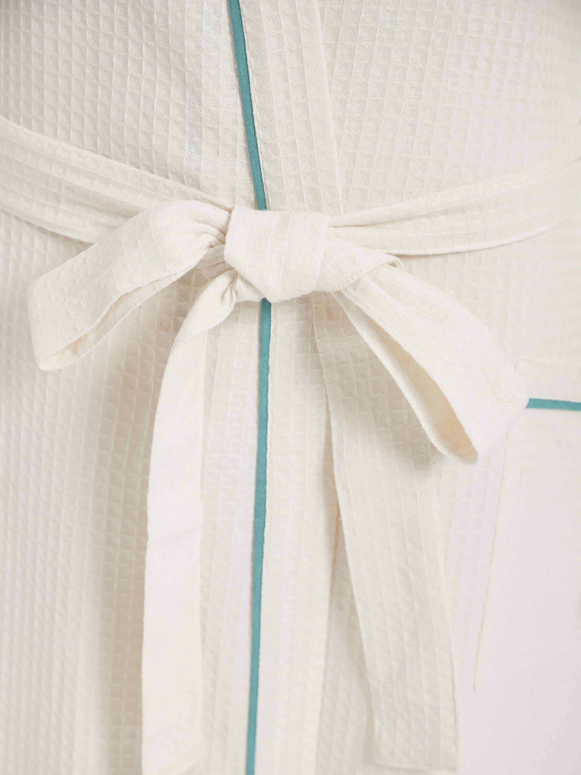 Angled view of Multi Floral Cotton Sanganeri Block Printed Bathrobe, focusing on the robe's fit and design.