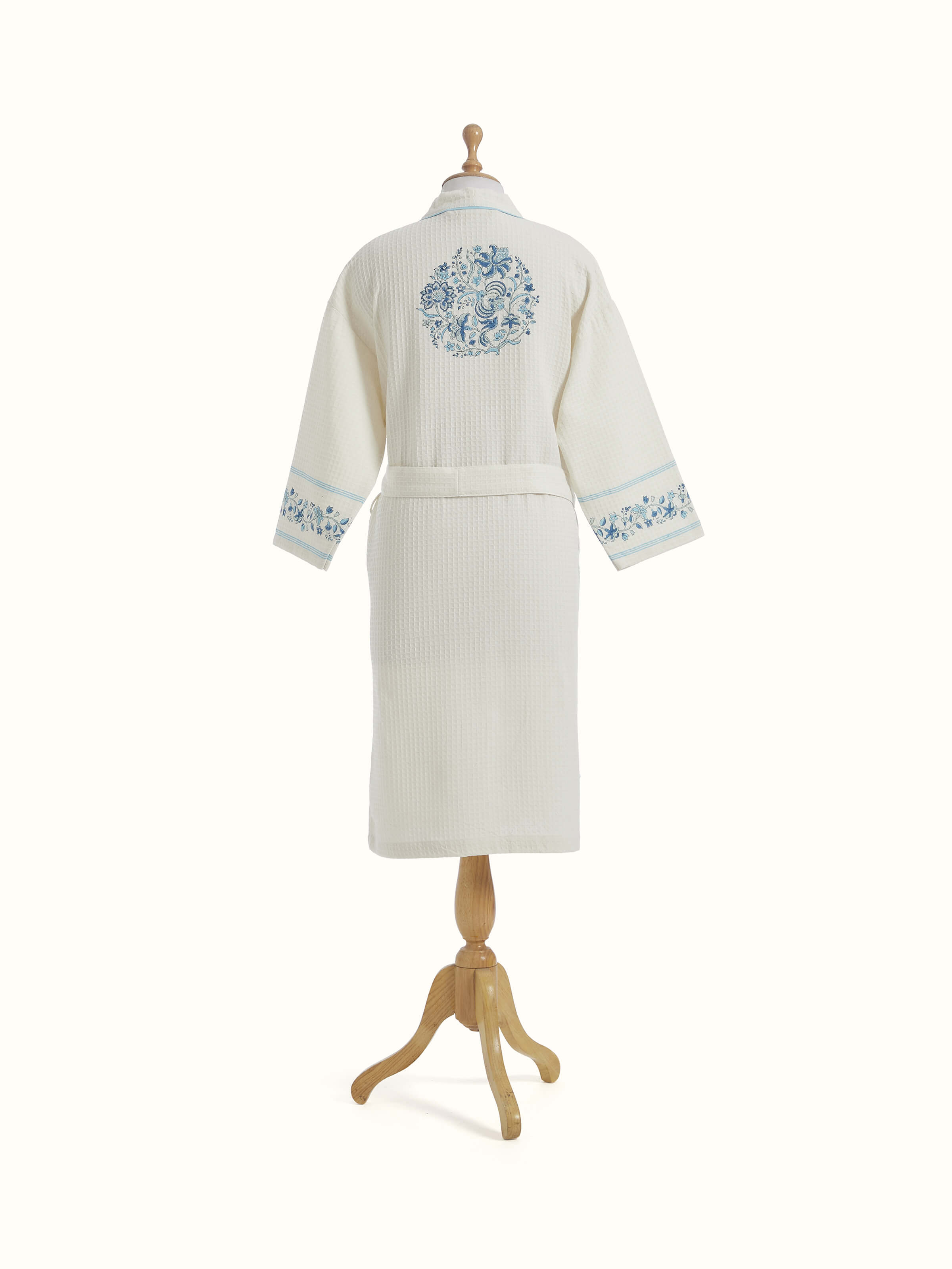 Angled view of Blue floral cotton Sanganeri block printed bathrobe showcasing the full design and relaxed fit.