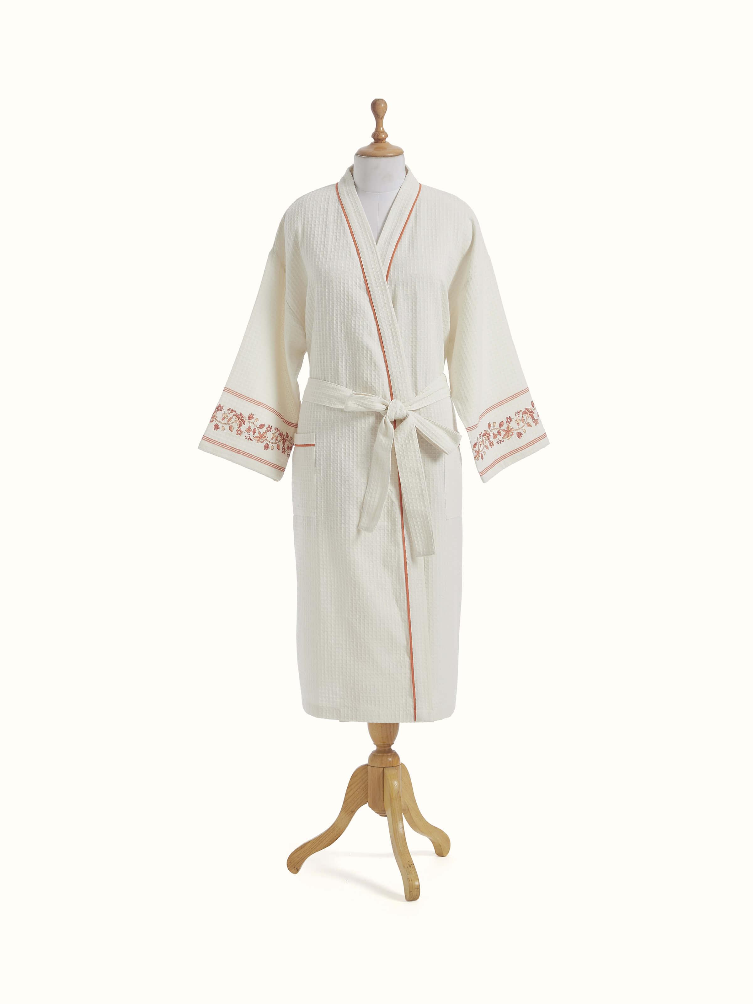 Front view of Palampore buta peach floral cotton Sanganeri block printed bathrobe showcasing floral print and design