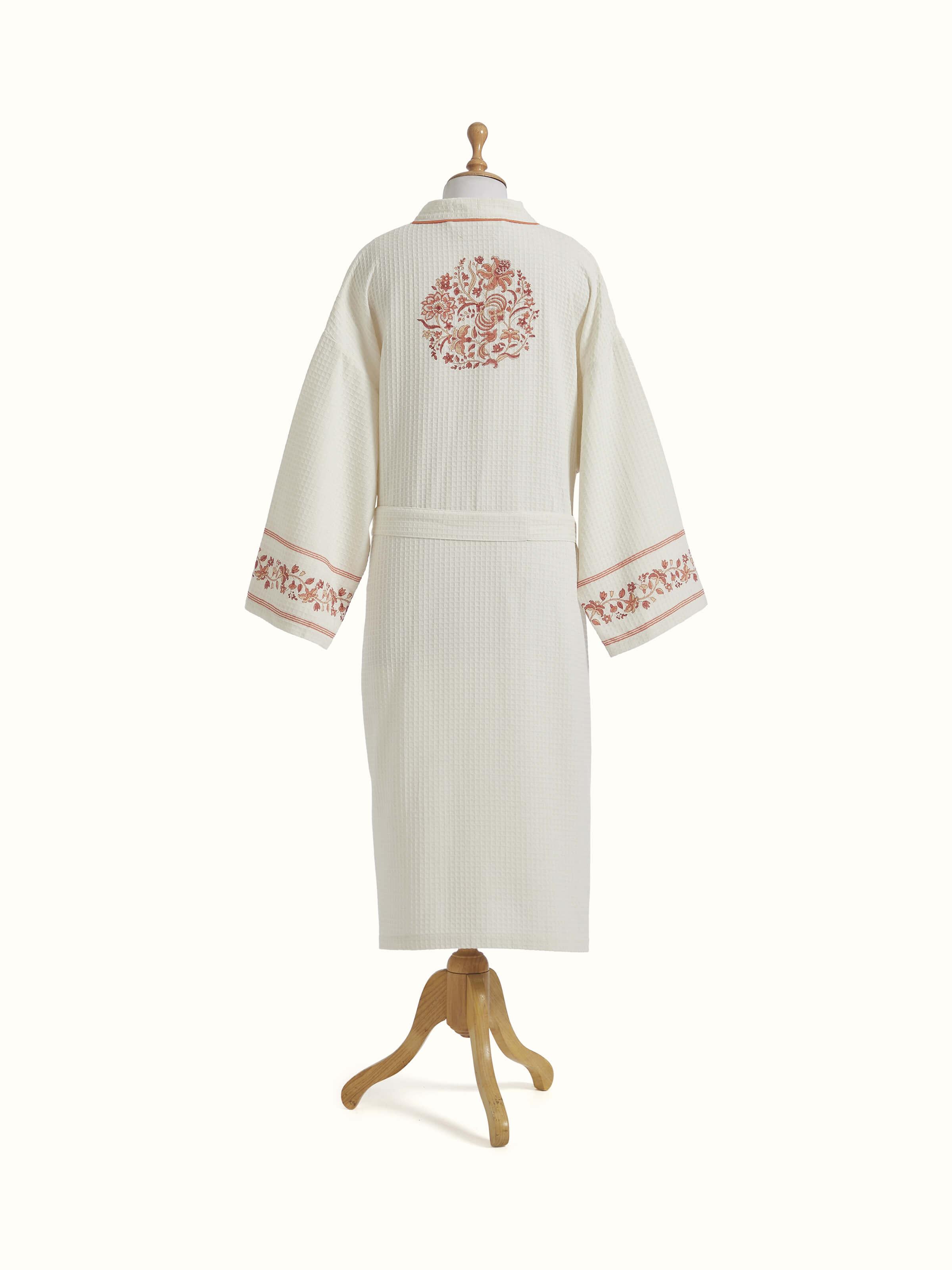 Detailed view of Palampore buta peach floral cotton Sanganeri block printed bathrobe showing fabric and print