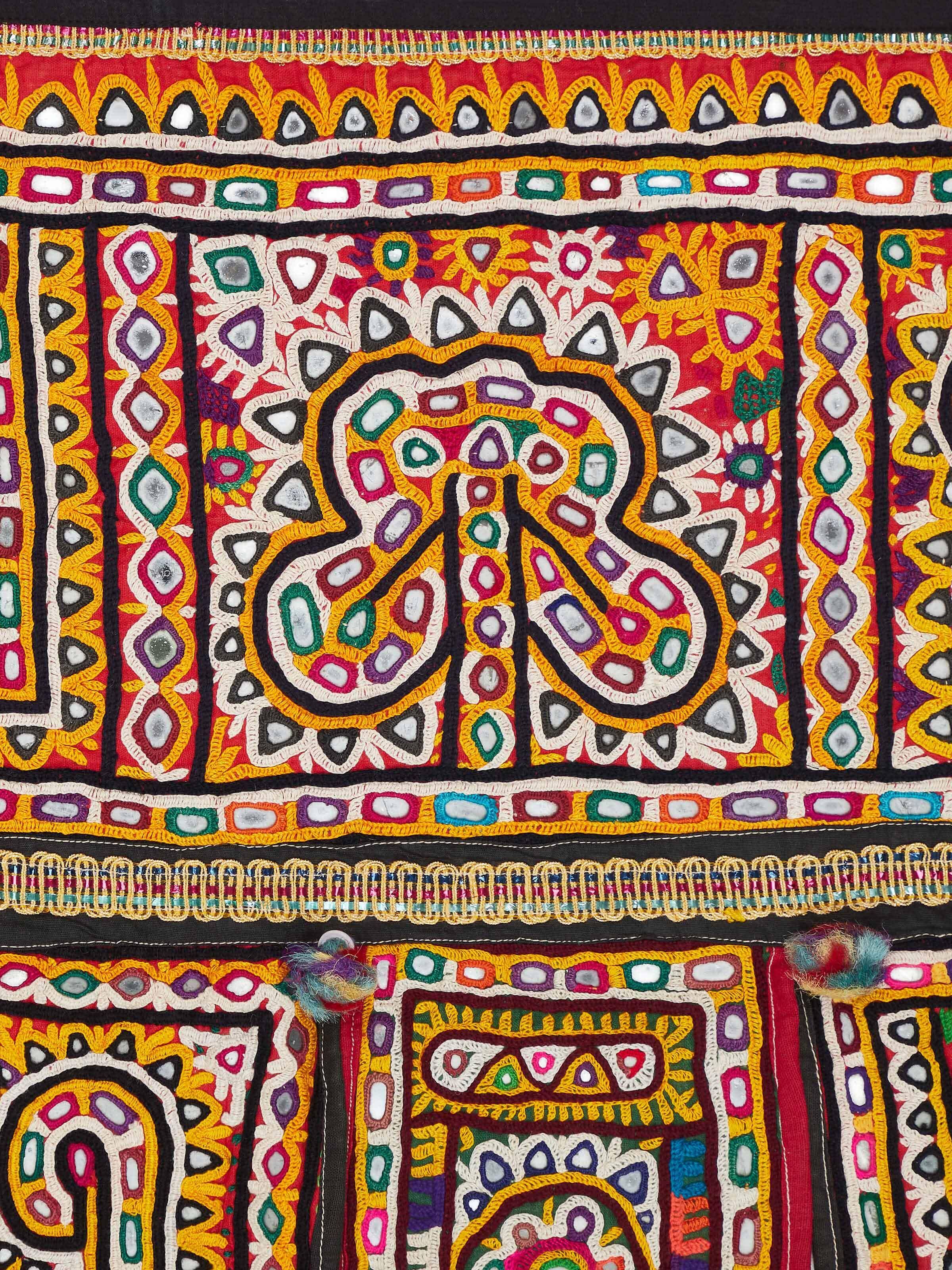 Close-up view of Kutch Embroidery Geometric Toran, focusing on the fine embroidery details