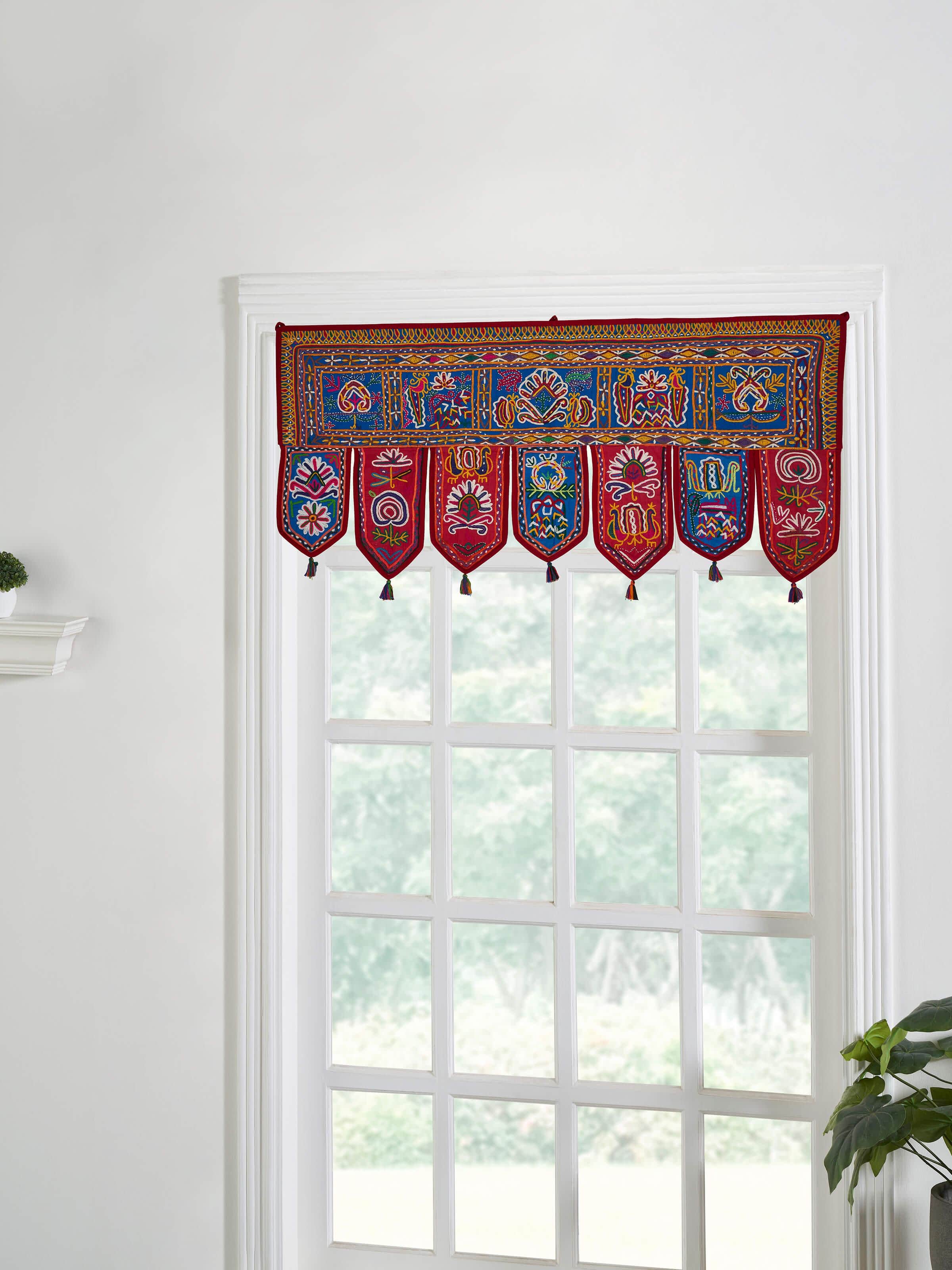 Side view of Kutch Embroidery Floral Toran by Swadesh highlighting the detailed embroidery and vibrant color contrast in the floral design.