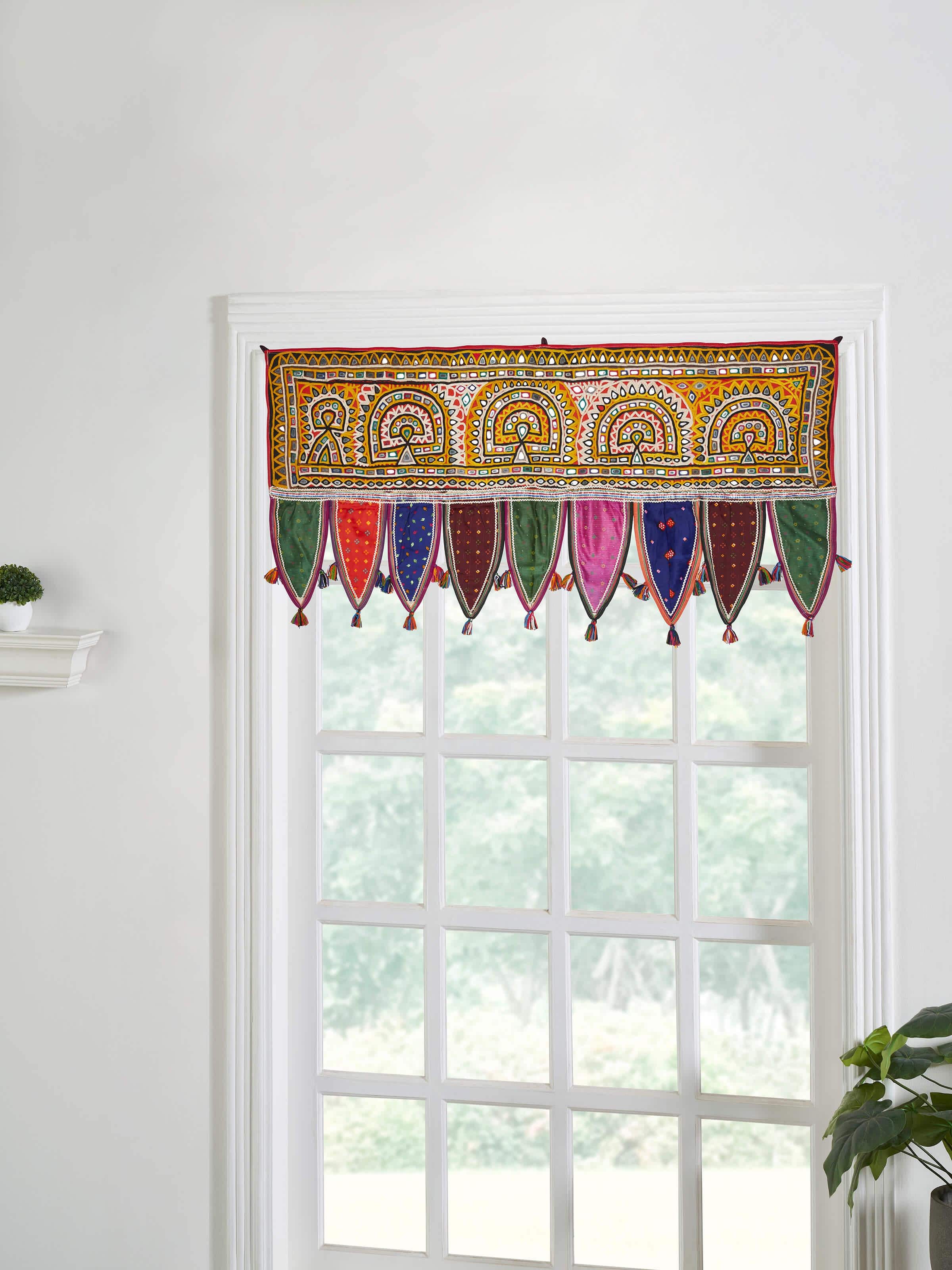 Side view of Kutch embroidery patterned toran highlighting its detailed needlework and vibrant colors